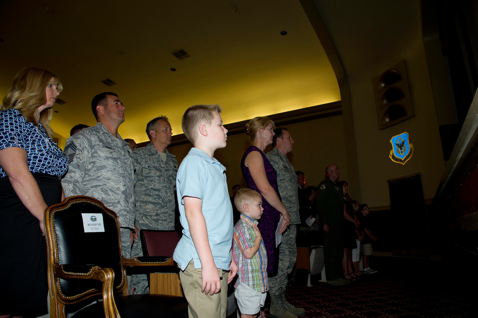 Lt. Col. Scott Minton, 912th Air Refueling Squadron incoming commander, takes command of the 912th ARS from Lt. Col. Brice Middleton, 912th ARS  outgoing commander, July 21, during a change of command ceremony in the Cultural Resource Center. Col. Shawn Teagan, 92nd Operations Group commander, Fairchild AFB, Wash., presided over the event. Senior Master Sgt. Eric Butt, 912th ARS first sergeant, holds the guidon which symbolizes the transfer of authority from the old to the new commander. (U.S. Air Force photo by Staff Sgt. Matthew Smith)