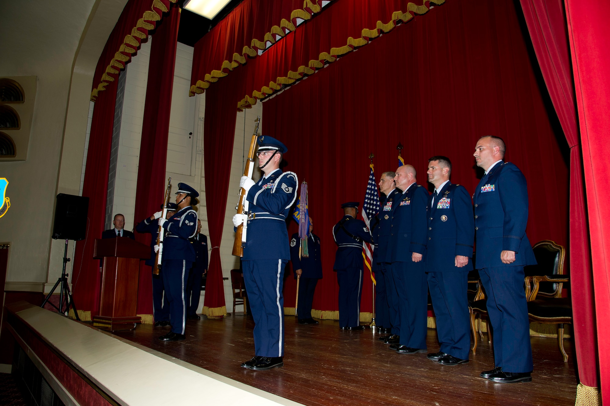 Lt. Col. Scott Minton, 912th Air Refueling Squadron incoming commander, takes command of the 912th ARS from Lt. Col. Brice Middleton, 912th ARS  outgoing commander, July 21, during a change of command ceremony in the Cultural Resource Center. Col. Shawn Teagan, 92nd Operations Group commander, Fairchild AFB, Wash., presided over the event. Senior Master Sgt. Eric Butt, 912th ARS first sergeant, holds the guidon which symbolizes the transfer of authority from the old to the new commander. (U.S. Air Force photo by Staff Sgt. Matthew Smith)