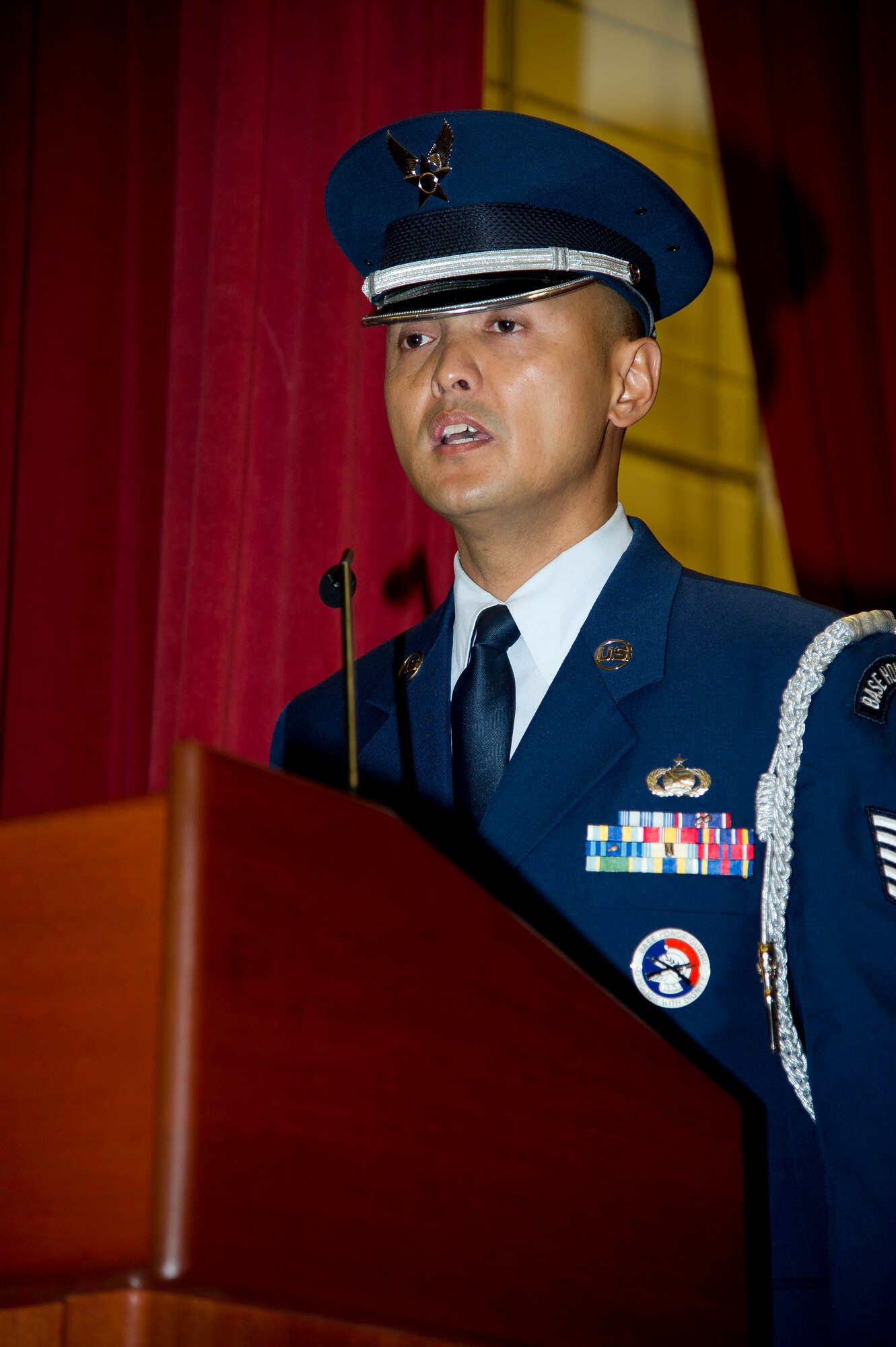 Lt. Col. Scott Minton, 912th Air Refueling Squadron incoming commander, takes command of the 912th ARS from Lt. Col. Brice Middleton, 912th ARS  outgoing commander, July 21, during a change of command ceremony in the Cultural Resource Center. Col. Shawn Teagan, 92nd Operations Group commander, Fairchild AFB, Wash., presided over the event. Senior Master Sgt. Eric Butt, 912th ARS first sergeant, holds the guidon which symbolizes the transfer of authority from the old to the new commander. (U.S. Air Force photo by Staff Sgt. Matthew Smith)