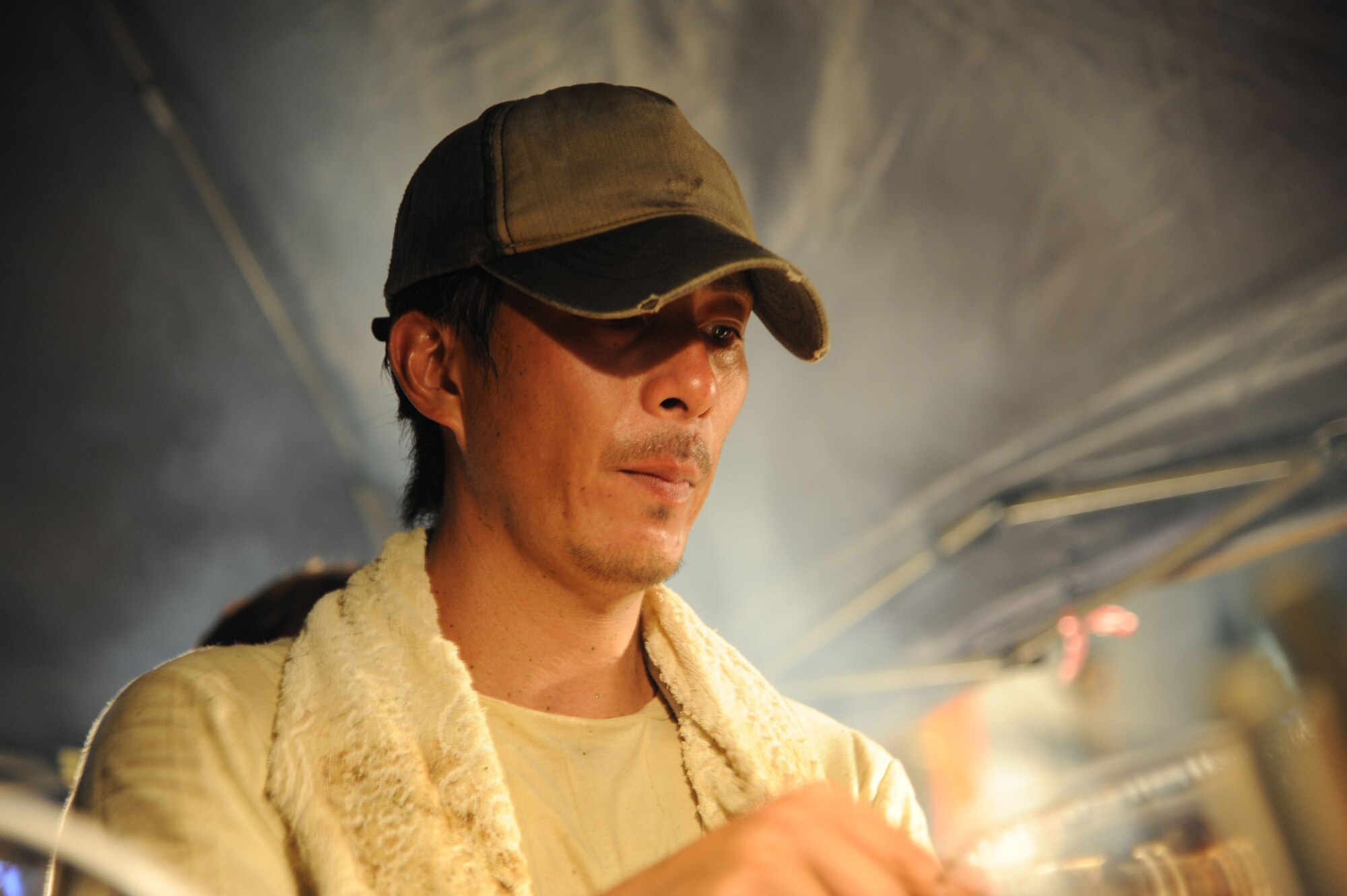 FUSSA CITY, Japan -- A street vendor cooks yakisoba at the Fussa Tanabata Festival Aug. 4, 2012, in Fussa City, Japan. Vendors featuring a variety of foods lined the streets of Fussa for festival participants to enjoy. (U.S. Air Force photo by Airman 1st Class Desiree Economides)