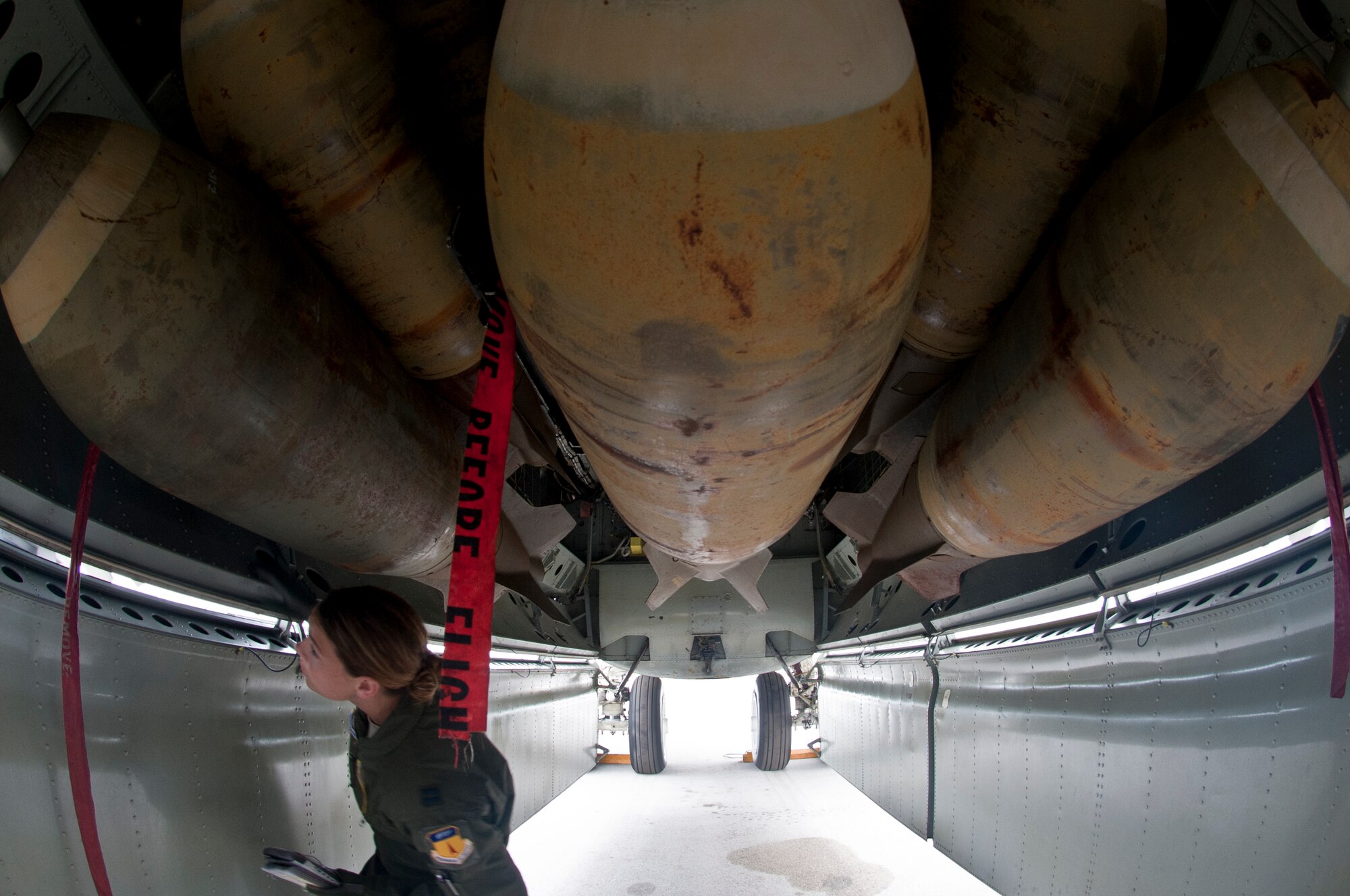 ANDERSEN AIR FORCE BASE, Guam-Members of the 69th Expeditionary Bomber Squadron, deployed in from Minot Air Force Base, North Dakota, perform pre-flight checks on a B-52 Stratofortress aircraft to participate in Exercise Pitch Black here August 2. PB 12 is a multilateral exercise conducted between the U.S. Marine Corps and Australian Defense Force, Royal Thai Armed Forces, Singapore Armed Forces, New Zealand Defense Force, Malaysian Armed Forces, French Armed Forces, British Armed Forces, Indonesian National Armed Forces and a component operating under the North Atlantic Treaty Organization in order to develop greater interoperability and a seamless response to regional crises. Greater collaboration between partner militaries strengthens regional peace, stability and prosperity.  (U.S. Air Force photo by Staff Sgt. Alexandre Montes)