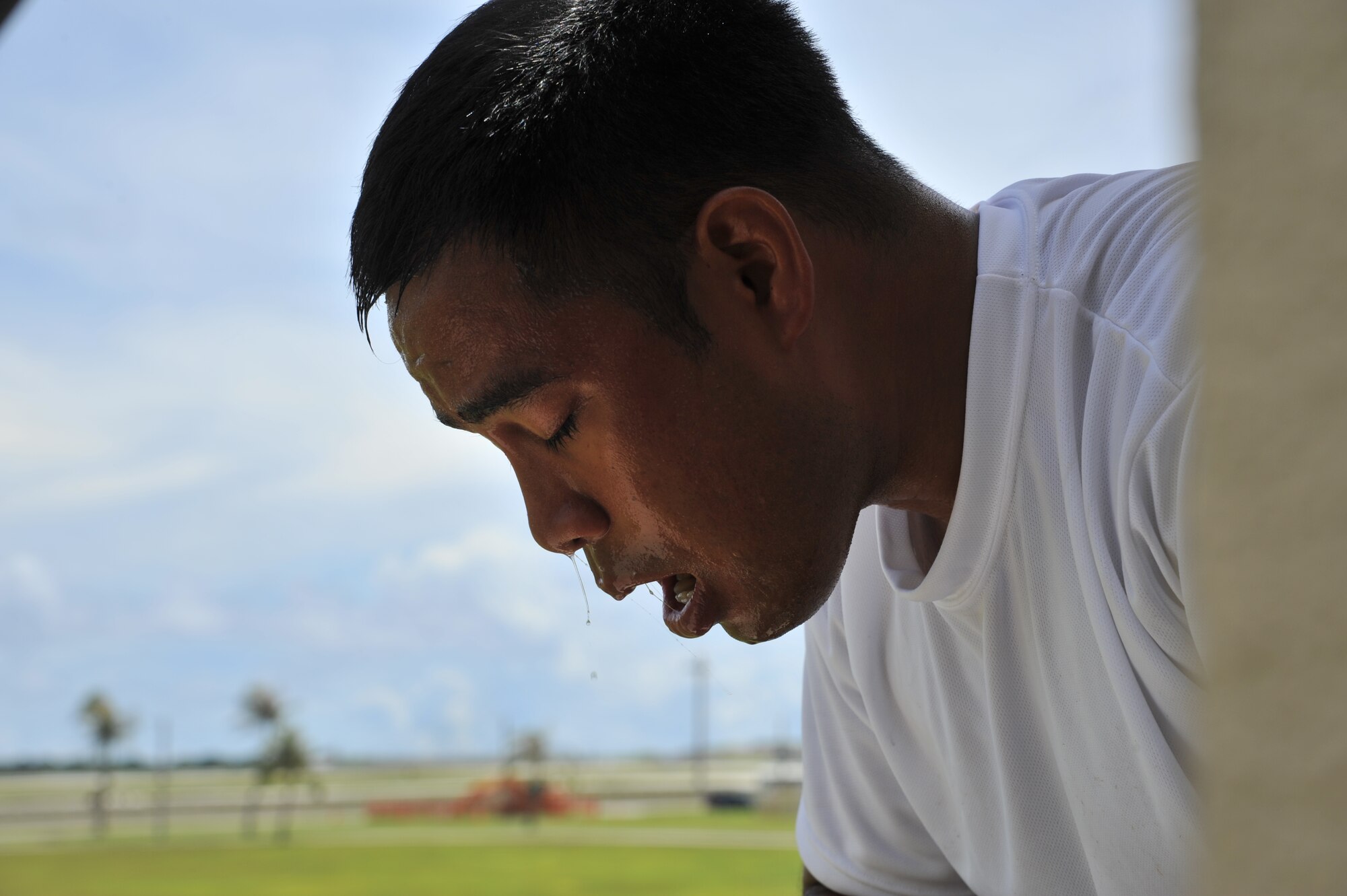 ANDERSEN AIR FORCE BASE, Guam-Department of Defense police officer cadets train with Oleoresin Capsicum Spray through a five-station obstacle course for qualification here July 27. After completing the course, the recruits will become DoD police officers for Andersen AFB and security guards for Naval Base Guam. This training is required so officers get first-hand experience using the weapon and can still perform their duties if they are sprayed during an incident. The academy is nine weeks for DoD police officer’s and five weeks for the security guards. The current class consists of 18 police officers and two security guards. Upon completion, 17 DoD police officers will be assigned to Andersen. This program was postured to enhance the security of the installation and ensure qualified personnel are manning the gates and patrols. (U.S. Air Force Photo by Staff Sgt. Alexandre Montes/RELEASED) 