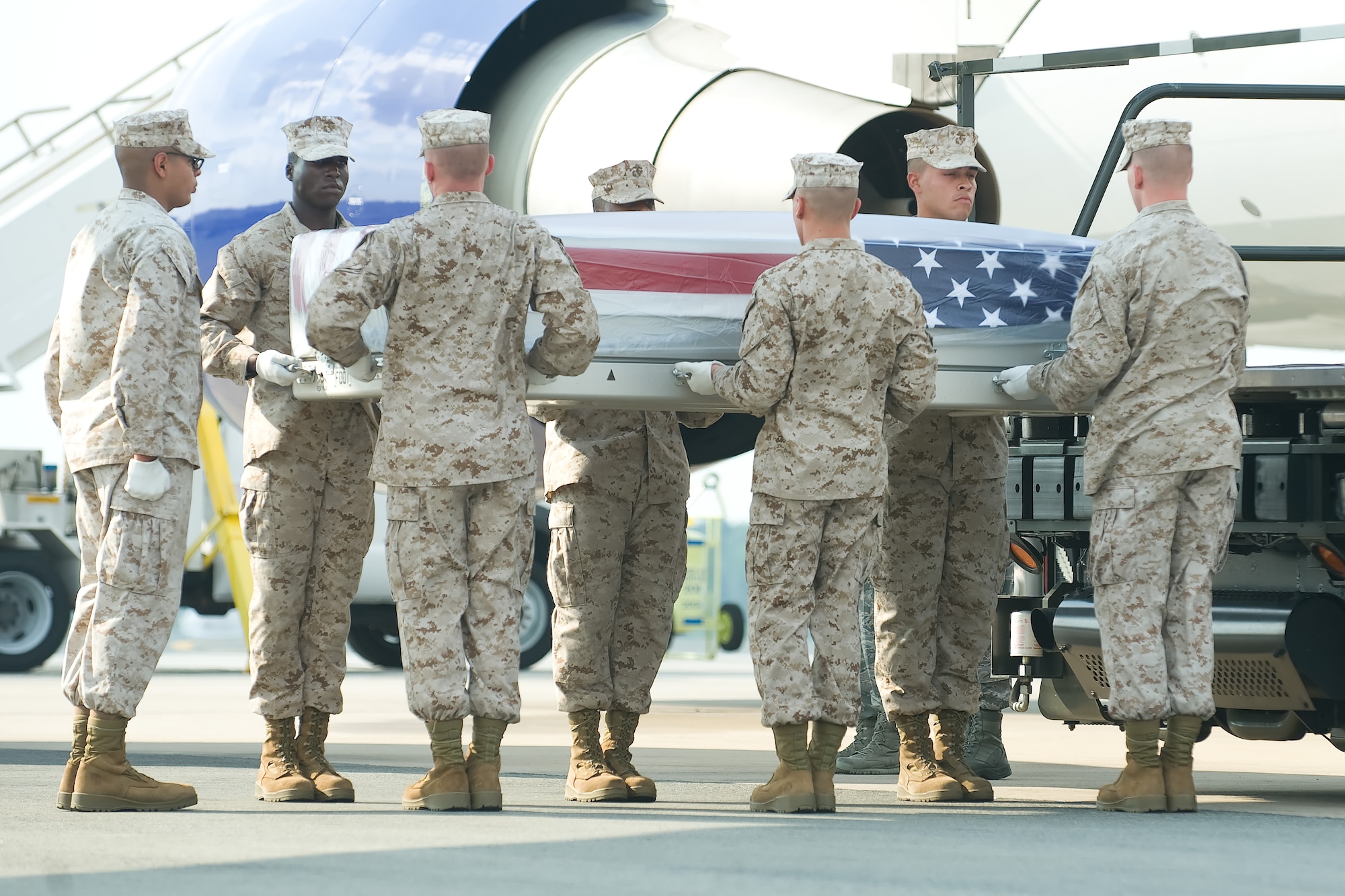 A U.S. Marine Corps carry team transfers the remains of Marine Lance Cpl. Curtis J. Duarte of Covina, Calif., at Dover Air Force Base, Del., Aug. 4, 2012. Curtis was assigned to 1st Battalion, 7th Marine Regiment, 1st Marine Division, I Marine Expeditionary Force, Twentynine Palms, Calif. (U.S. Air Force photo/Adrian R. Rowan)