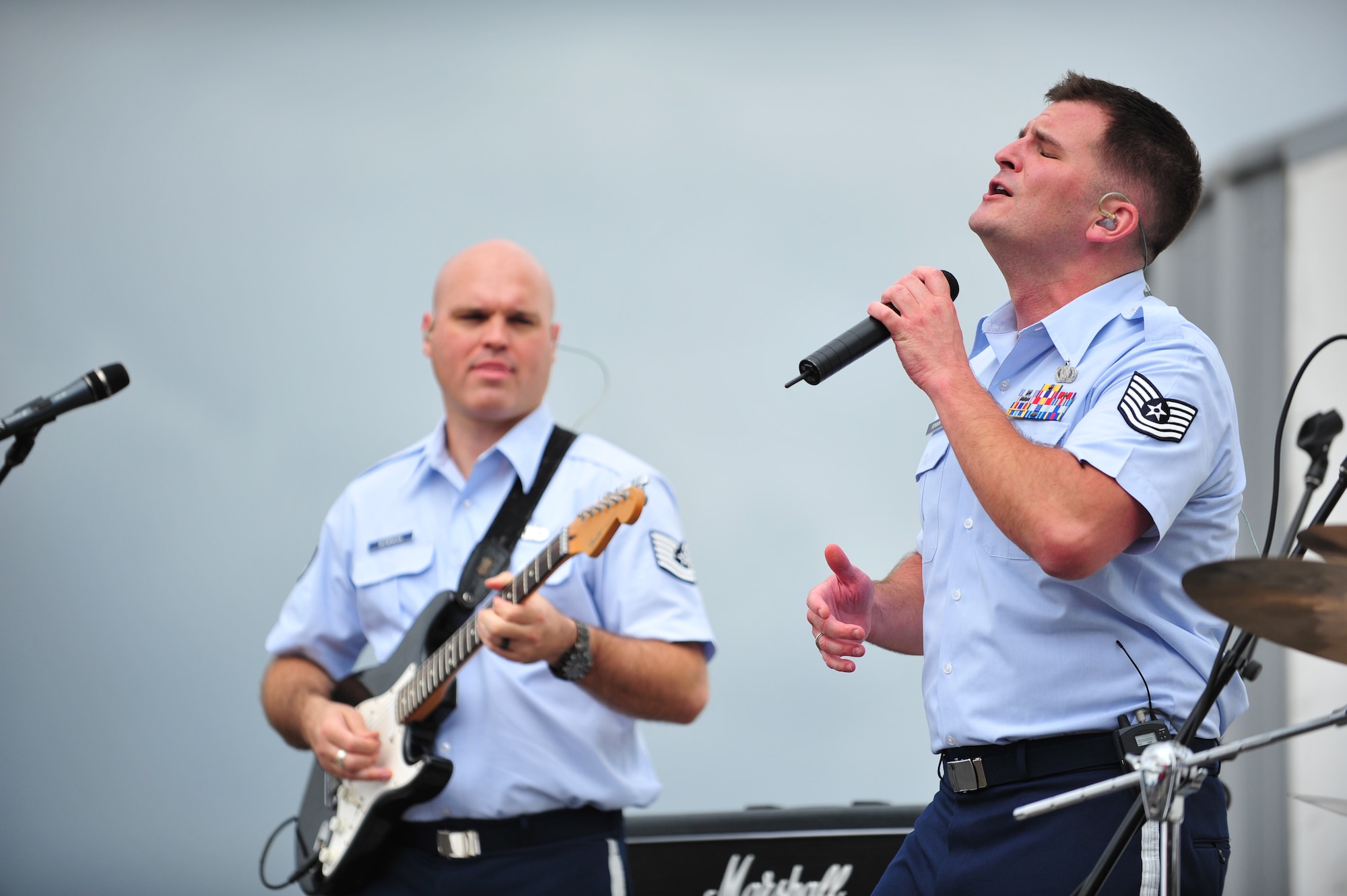 (l-r)Tech. Sgt. Jason Cale and Tech. Sgt. Craig Bowman perform during Open House at Lajes Field, Aug. 5, 2012.  Cale and Bowman are part of the US Air Forces in Europe band, Touch ‘N Go. (U.S. Air Force photo by Tech. Sgt. Chenzira Mallory)

