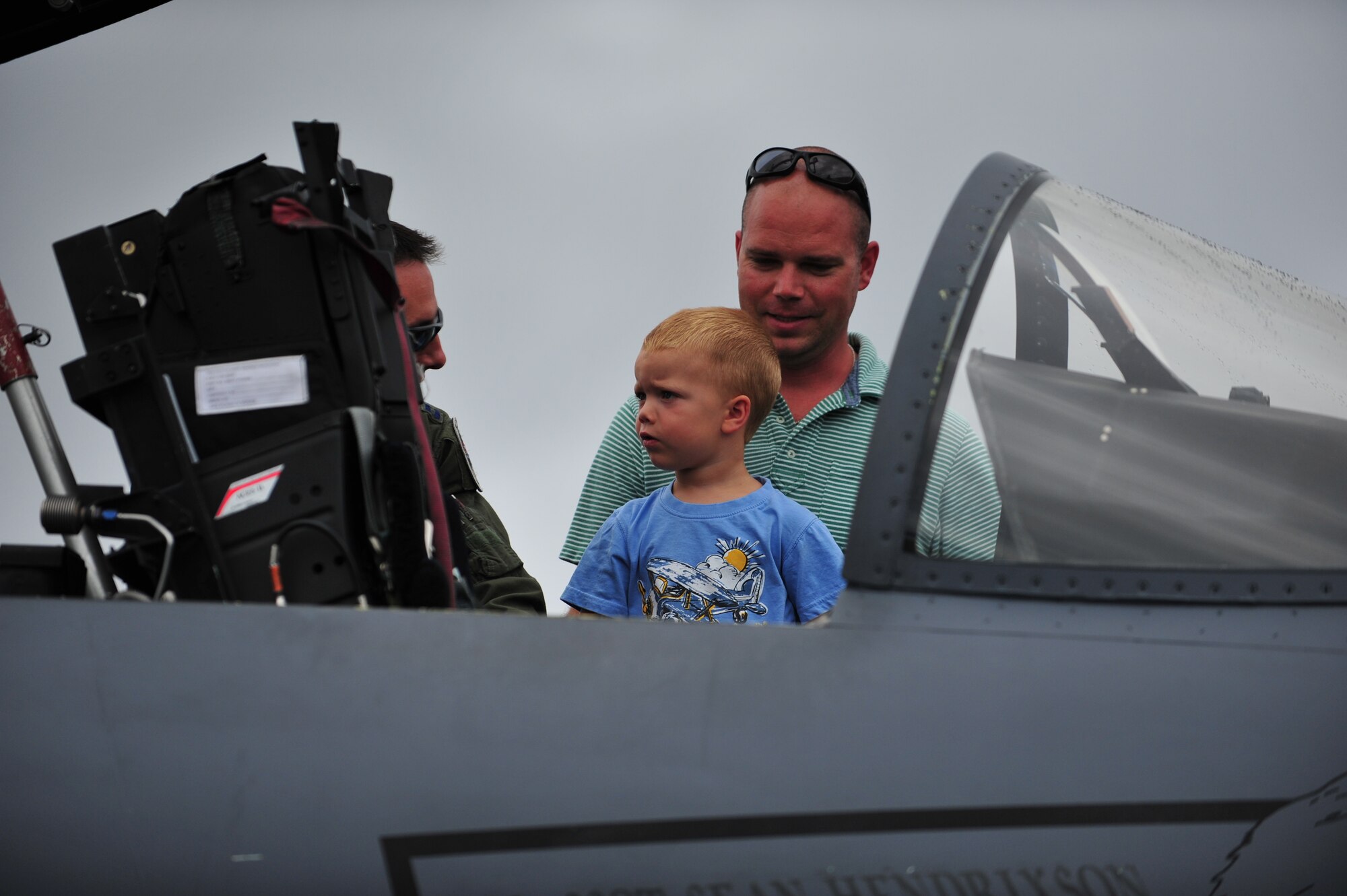 Colin Goetzman, 3, son of Master Sgt. Shelby Goetzman, 65th Operations Support Squadron air traffic controller, looks around the inside of an F-15C Eagle during Open House at Lajes Field, Aug. 5, 2012.  Members of the 65th Air Base Wing supported an Open House event hosted by their Portuguese Air Force partners at Lajes Field.  The event featured various activities including a mini bazaar, military working dog demonstrations, aircraft displays and live performances by the US Air Forces in Europe Band, Touch ‘n Go.  (U.S. Air Force photo by Tech. Sgt. Chenzira Mallory)

