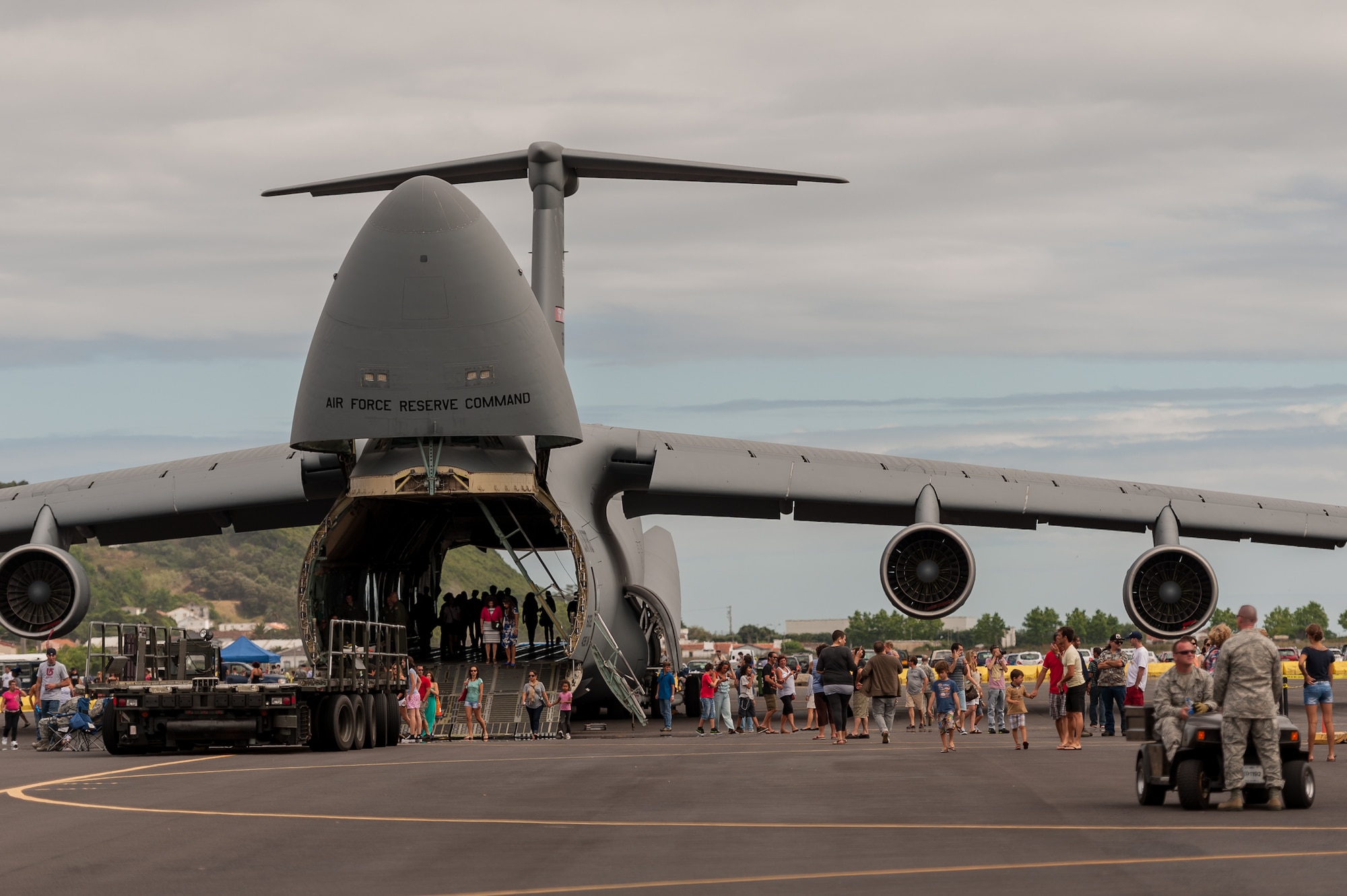 Members of the 65th Air Base Wing supported an Open House event hosted by our Portuguese Air Force partners at Lajes Field.  Cooperation and solidarity with the Portuguese and U.S Air Forces enabled the base to open its gates during the Azores’ busiest time of the year; Praia Fest.  The Open House provided an opportunity for Team Lajes to showcase our military readiness and capabilities to our local community.  The event featured various activities including a mini bazaar, military working dog demonstrations, aircraft displays and  live performances by Rock After Midnight (R.A.M) and the USAFE Band, Touch ‘n Go.  (Photo by Lucas Silva)