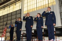 YOUNGSTOWN AIR RESERVE STATION, Ohio -- The 910th Logistics Readiness Squadron and 76th Aerial Port Squadron performed a combined change of command ceremony Aug. 4, 2012, here. 

Col. Teresa Hams, 910th Mission Support Group commander, Lt. Col. Robert Hudson, outgoing 910th LRS commander, Lt. Col. Jeanne Bisesi, incoming 910th LRS commander and outgoing 76th APS commander, and Maj. Gregory Meyer, incoming 76th APS commander, render salutes during the singing of the national anthem.
