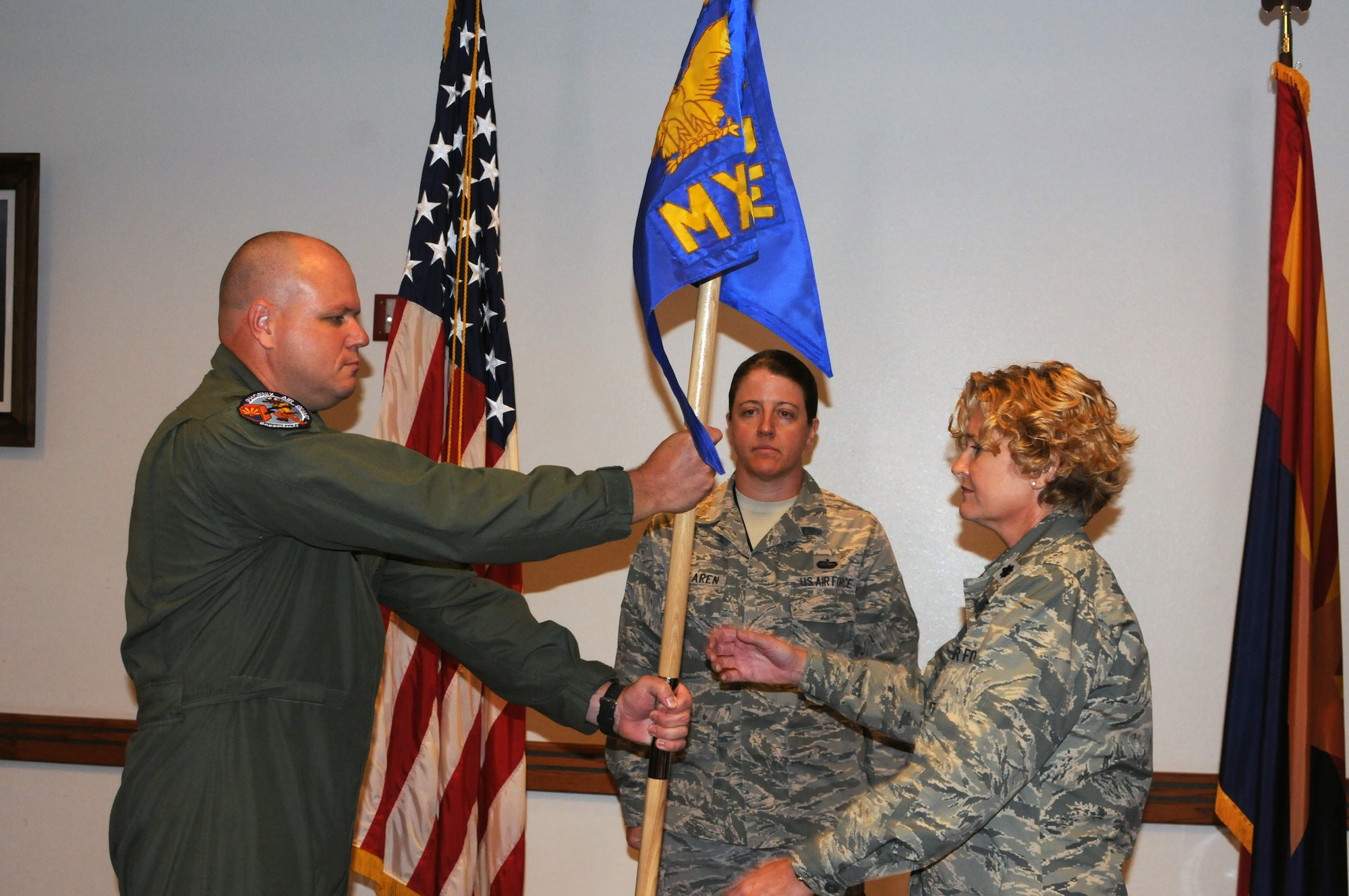 In a ceremony presided over by Col. Gary Brewer Jr., 161st Maintenance Group commander, Lt. Col. Aimee Storm assumed command of the 161st Maintenance Squadron.

Colonel Storm recently concluded an active duty tour in Germany where she served as an Operational Decision Support officer at United States European Command and the Force Support Squadron commander at the 52nd Fighter Wing at Spangdahlem Air Base, Germany. 

After enlisting in June 1990 into a consolidated air maintenance squadron in the Ohio Air National Guard as a munitions systems specialist, she transferred to the Colorado Air National Guard and became additionally qualified in munitions operations. In 1993, she transferred to the Arizona Air National Guard and commissioned as a personnel officer at the 161st Air Refueling Wing in 1995. 

Colonel Storm’s officer assignments also include services flight commander, homeland security coordinator, and military personnel management officer. 

“For many years I have wanted to get back into maintenance.” Colonel Storm said. “To me, this assignment is like coming home.”
(U.S. Air Force photo by Tech. Sgt. Susan Gladstein/Released)