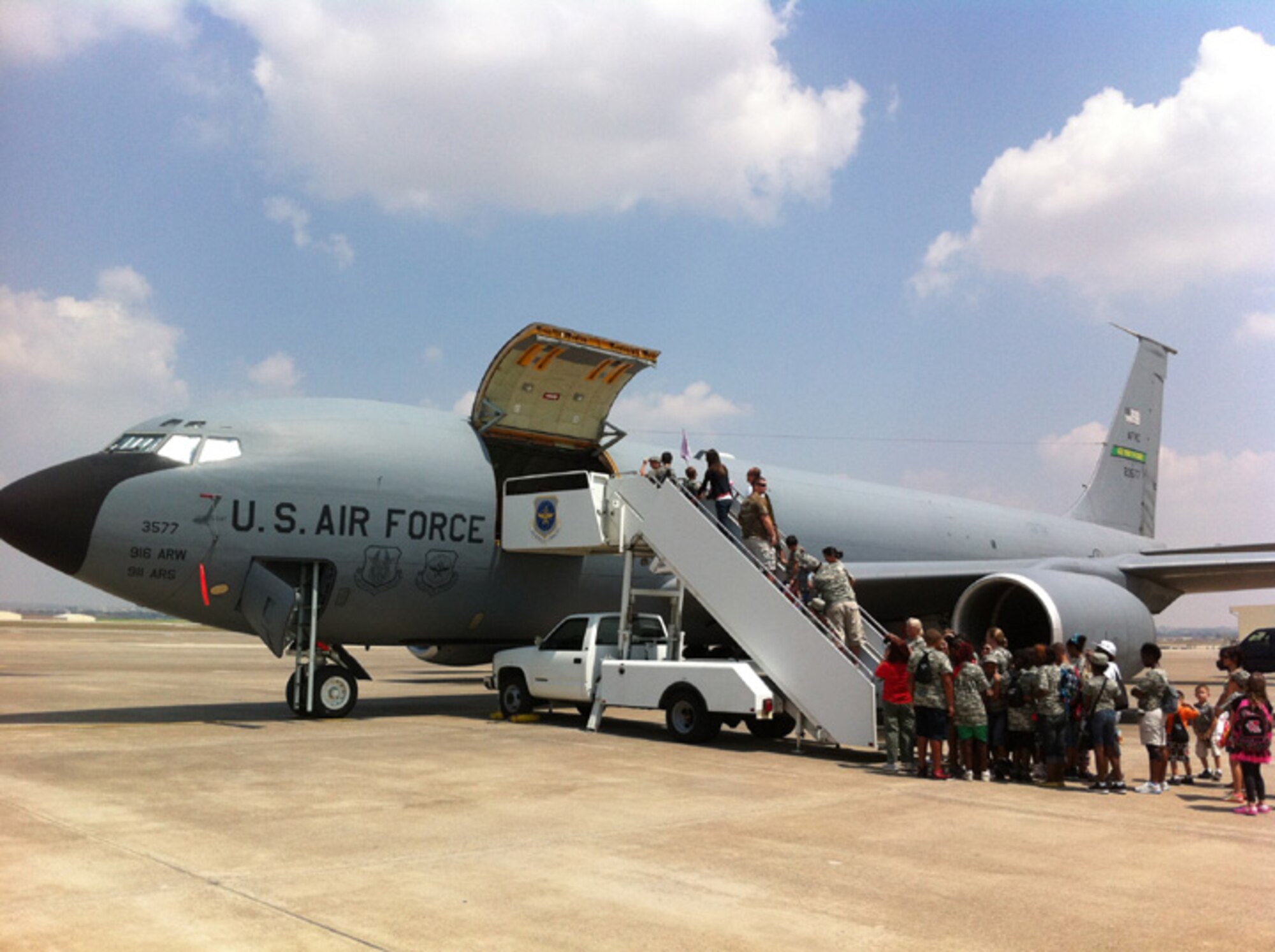 Families at Incirlik Air Base, Turkey participate in Operation Deployment learning about the mission of the KC-135R Stratotanker. (USAF photo courtesy of SMSgt. William Lester)