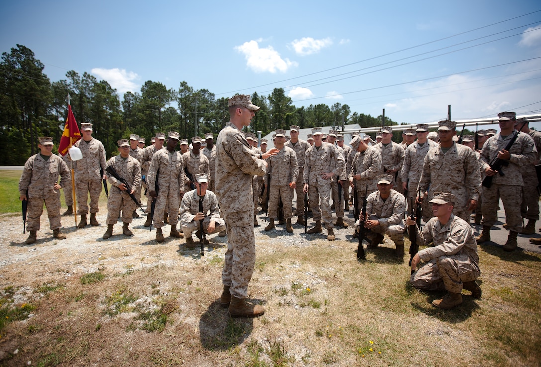 Sergeant Christopher Parks, an Corporal's Course Instructor, gives instructions to the Marine in Corporal's Course Class 6-12 on conducting defensive operations at The Staff Non-Commissioned Officer’s Academy on Camp Johnson, N.C., June 22. The course is the first in a series of professional military education classes at the academy that provides Marines with leadership training to enhance their professional qualifications as they take on greater responsibility. 