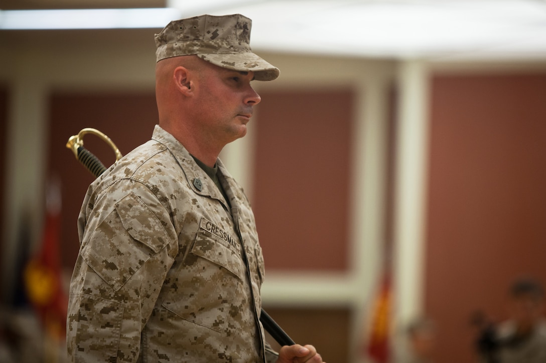 Sergeant Maj. Craig D. Cressman stands ready to relinquish his post as the sergeant major of II Marine Expeditionary Force Headquarters Group to Sgt. Maj. Joseph D. Shaw during a relief and appointment ceremony at Camp Lejeune, Aug. 2. Cressman has spent nearly two years as the command's senior enlisted advisor during which they deployed to Helmand Province, Afghanistan as Task Force Belleau Wood in support of Operation Enduring Freedom. He will be taking over the duties as the sergeant major of Headquarters and Service Battalion, Headquarters Marine Corps, Henderson Hall located in Washington D.C.
