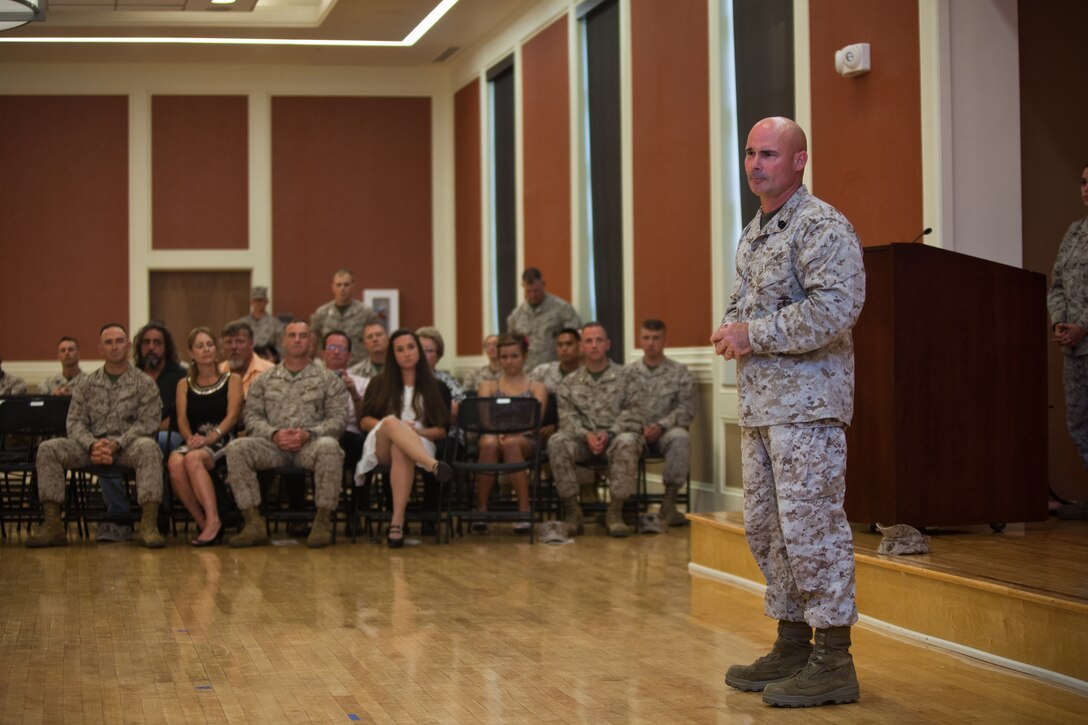 Sergeant Maj. Craig D. Cressman, the outgoing sergeant major of II Marine Expeditionary Force Headquarters Group, speaks to friends, family members and fellow Marines during a relief and appointment ceremony at Camp Lejeune, Aug. 2. Cressman has spent nearly two years as the command's senior enlisted advisor during which they deployed to Helmand Province, Afghanistan as Task Force Belleau Wood in support of Operation Enduring Freedom. He will be taking over the duties as the sergeant major of Headquarters and Service Battalion, Headquarters Marine Corps, Henderson Hall located in Washington D.C.