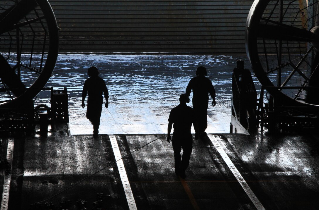 ZB219-069: A Landing Craft Air Cushion creates a small lake in the rear of the USS San Antonio as it docks with the ship on its way to Rockland, Maine, for Maine’s 2012 Lobster Festival, July 30, 2012.  The USS San Antonio and the equipment brought on board by the LCAC will provide the viewing public a glimpse of the combined Marine-Navy capabilities from Aug. 1 to 5. (Photo by Lance Cpl. Paul Peterson)