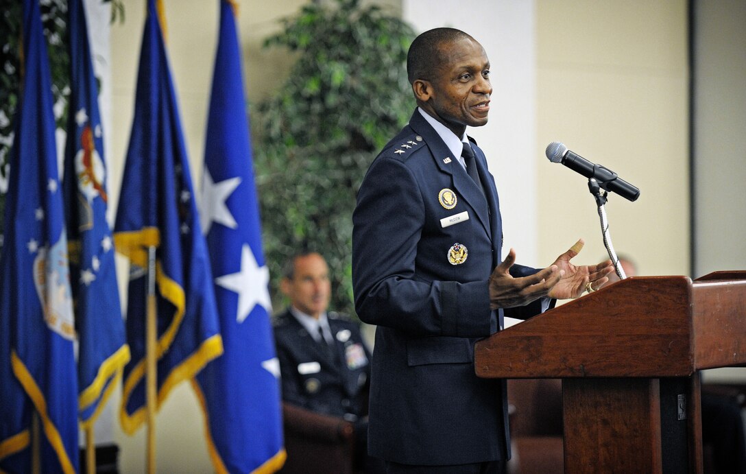 SCOTT AIR FORCE BASE, Ill. - Lt. Gen. Darren McDew, 18th Air Force commander, gives his first speech as the new commander during a change of command ceremony Aug. 6, 2012 at Scott Air Force Base, Ill.  Prior to his current assignment, McDew was the Commander, Air Force District of Washington at Joint Base Andrews, Md. The outgoing commander, Lt. Gen. Mark Ramsay, has accepted his new position as Director Joint Staff Force Structure, Resources and Assessment Directorate. (U.S. Air Force photo/ Staff Sgt. Ryan Crane)