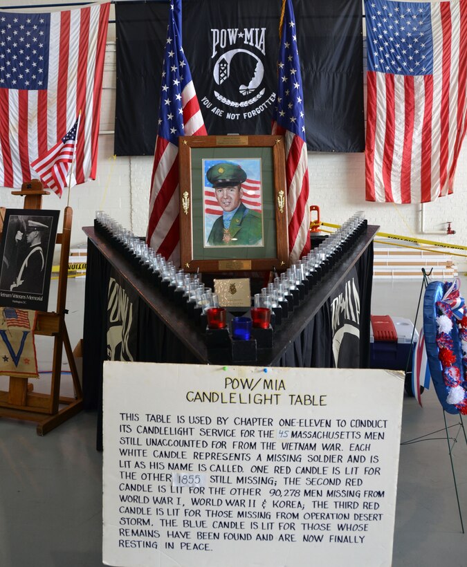 The POW*MIA table inside the Base Hangar August 5th, 2012. The Air Show this year is the largest Westover has had since 1974, boasting more than 60 aircraft. (U.S. Air Force photo/SrA. Kelly Galloway)