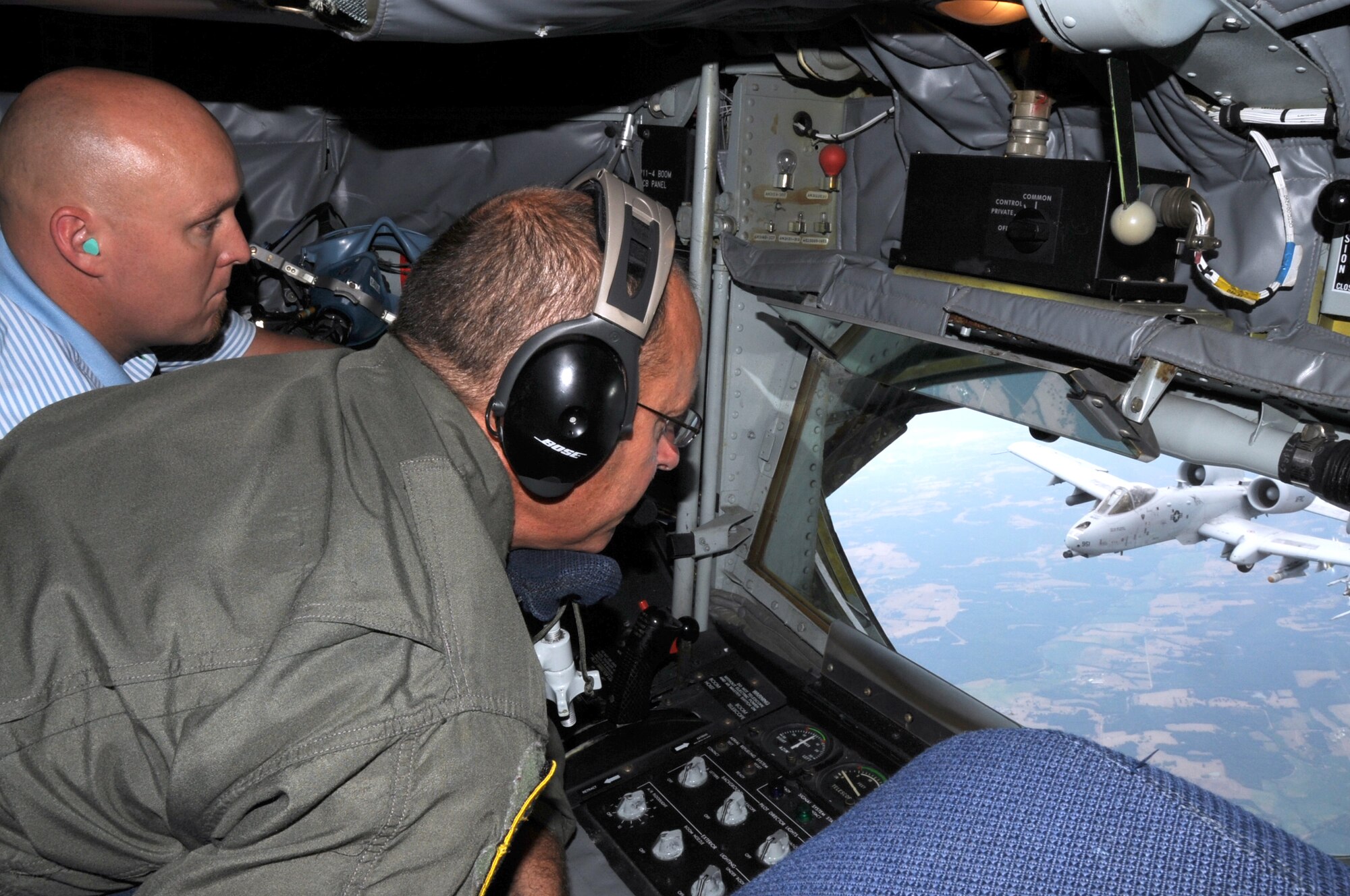 A civilian employer of a 442 Fighter Wing reservist, observes the refueling of an A-10 Thunderbolt II while aboard a KC-135 Stratotanker for a refueling mission during Employer Day, Aug. 4, 2012 here. Employer Day allows the civilian employers of Air Force reservists the opportunity to see what their employees do on their Reserve weekend as well as thank the employees for their flexibility and support. The 303 FS is assigned to the 442 FW, an Air Force Reserve unit stationed at Whiteman Air Force Base Mo. (U.S. Air Force photo/Staff Sgt. Lauren Padden)
