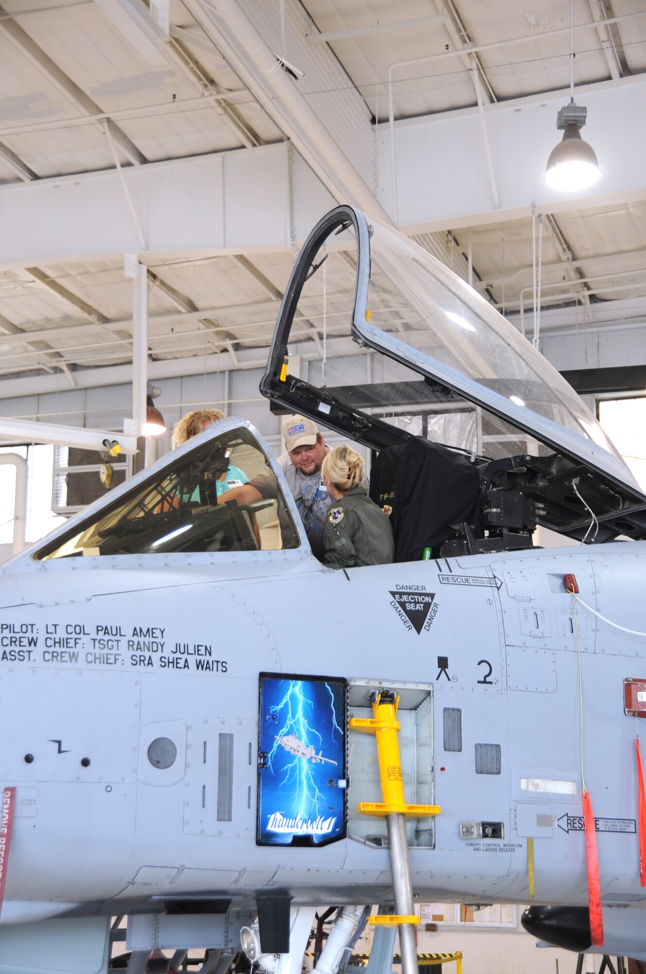 A-10 Thunderbolt II pilot Maj. Audrey Orek, 303rd Fighter Squadron, answers questions about the A-10 to civilian employers of 442nd Fighter Wing reservists during Employer Day, Aug. 4, 2012 here.  Employer Day allows the civilian employers of Air Force reservists the opportunity to see what their employees do on their Reserve weekend as well as thank the employees for their flexibility and support. The 303 FS is assigned to the 442 FW, an Air Force Reserve unit stationed at Whiteman Air Force Base Mo. (U.S. Air Force photo/Staff Sgt. Lauren Padden)