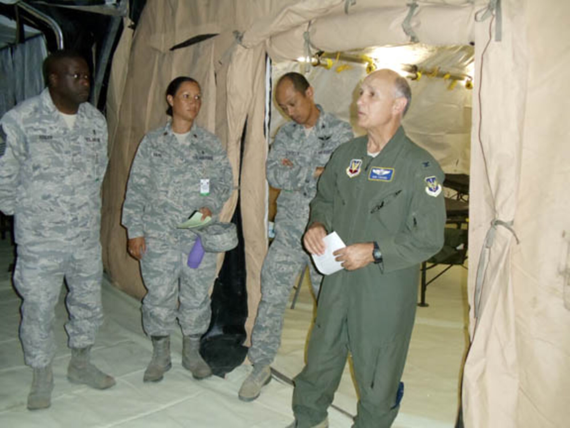 Col. (Dr.) Robert Todaro, Air Forces Northern Command Surgeon, briefs members of the expeditionary medical support team during Vibrant Response 13. (Photo by Daizy Labee).

