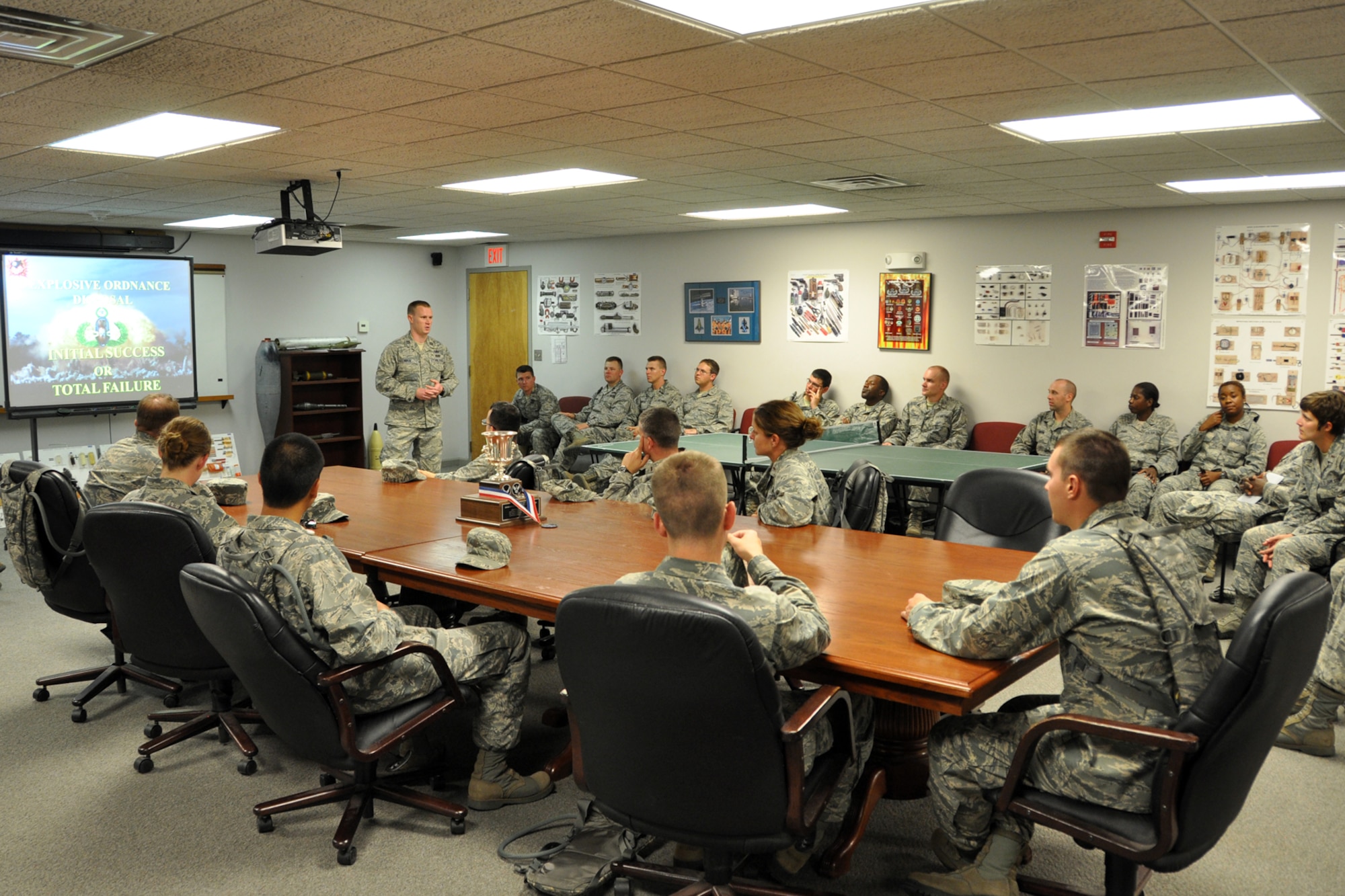 Capt. Chad Hogue, commander of the 2nd Civil Engineer Squadron, Explosive Ordinance Disposal Flight, briefs a group of Chaplain Candidates in the EOD training room at Barksdale Air Force Base, La., July 31, 2012. A tour of the EOD complex was part of The Chaplain Candidate Intensive Internship program’s visit to Barksdale from July 27 to Aug 2, 2012. (U.S. Air Force photo by Master Sgt. Jeff Walston)