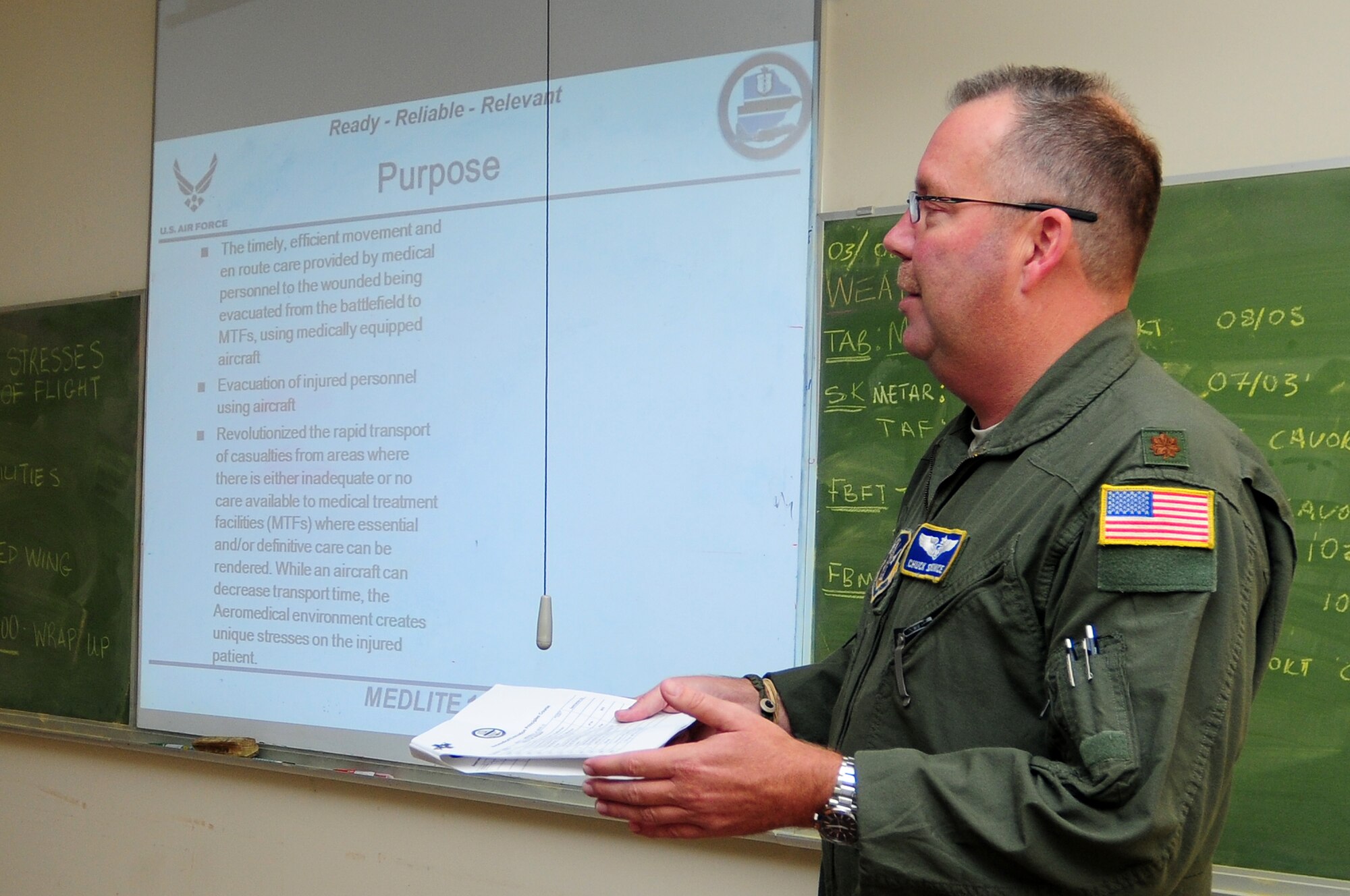 THEBEPHATSWA AIR BASE, Botswana – U.S. Air National Guard Maj. Chuck Scronce, 156th Aeromedical Evacuation Squadron flight nurse, briefs members of the Botswana Defense Force as part of MEDLITE 12, Aug. 6, 2012. MEDLITE is an annual exercise bringing together U.S. Forces personnel with counterparts from militaries throughout Africa. The goal of the exercise is to enhance capabilities and work together by introducing the U.S. Aeromedical Evacuation system of patient movement to the BDF military personnel. (U.S. Air Force photo/Senior Airman Lausanne Morgan)