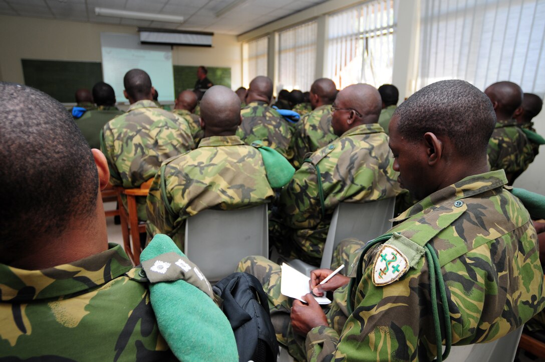 THEBEPHATSWA AIR BASE, Botswana -- Members of the Botswana Defense Force attend an introduction to aeromedical evacuation class as part of MEDLITE 12, Aug. 6, 2012. MEDLITE is an annual exercise bringing together U.S. forces personnel with counterparts from militaries throughout Africa. The goal of the exercise is to enhance capabilities and work together by introducing the U.S. Aeromedical Evacuation system of patient movement to the BDF military personnel. (U.S. Air Force photo/Senior Airman Lausanne Morgan)