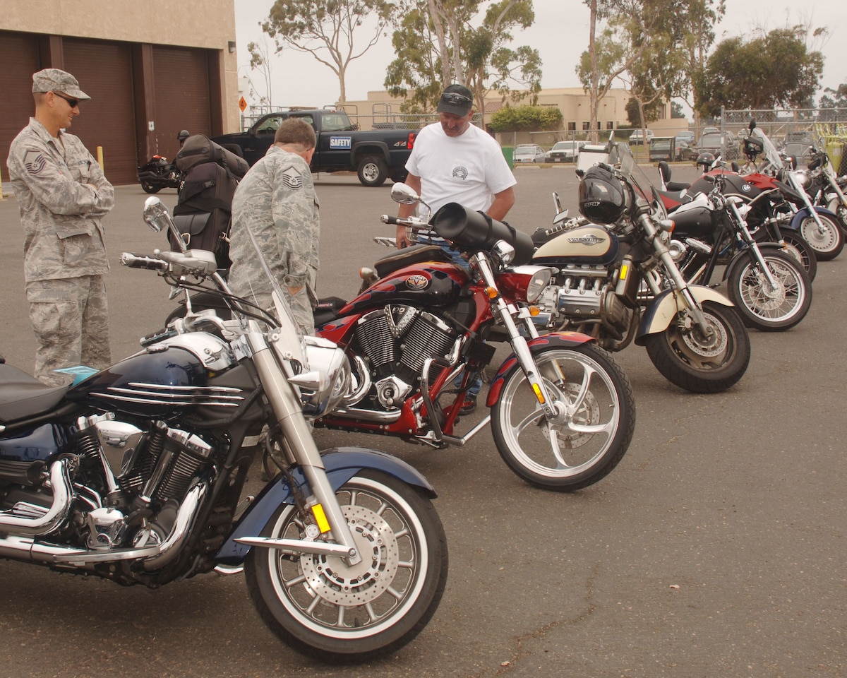 Vendors including Tri County Motor Worx, Harley Davidson, and Cal Coast Motorsports provided protective equipment and information on motorcycle safety as well as various prizes to Airmen who participated in the raffle on Aug. 4, 2012 in front of the Security Forces building.(U.S. Air Force photo by: Senior Airman Nicholas Carzis)