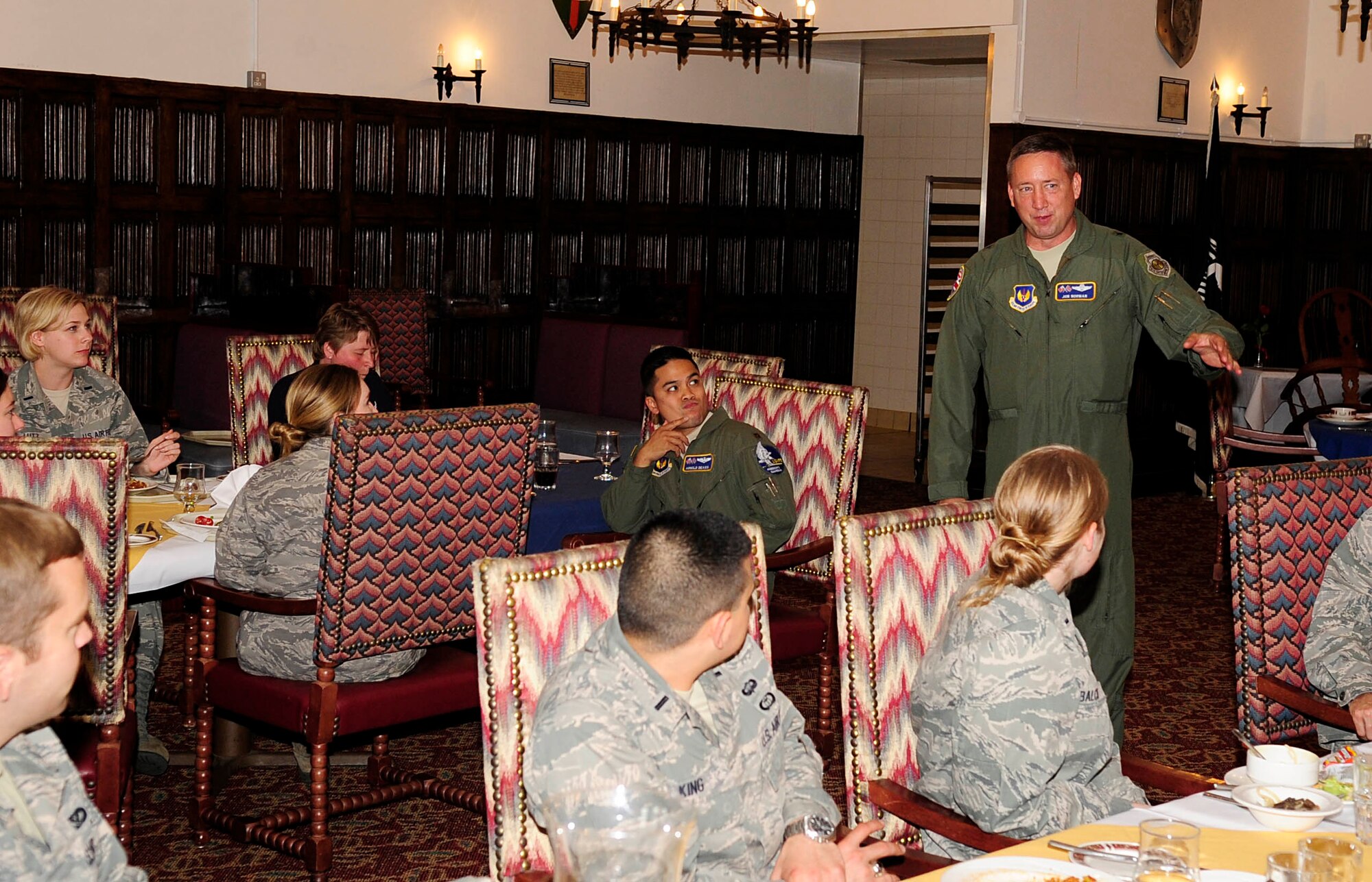 RAF MILDENHALL, England – Brig. Gen. Jon Norman, Director to United States Air Forces in Europe-United Kingdom, speaks to Team Mildenhall Airmen during a luncheon at the Gateway Dining Facility Aug. 6, 2012. Norman took a tour of RAF Mildenhall to speak with Airmen and familiarize himself with the base mission. (U.S. Air Force photo/Senior Airman Ethan Morgan)