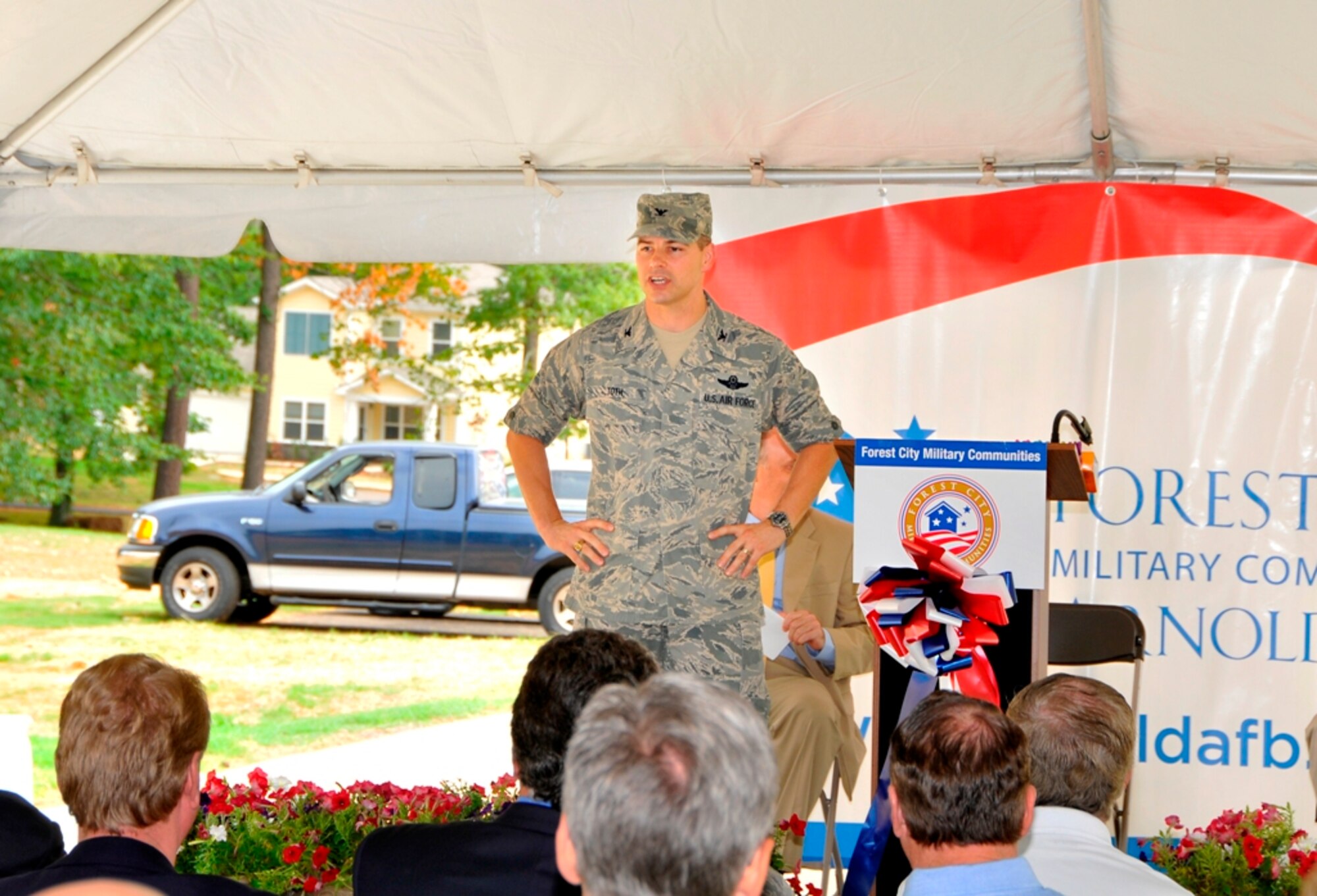 AEDC Commander Col. Raymond Toth speaks to the crowd in attendance at the dedication ceremony for the new on-base housing at Arnold AFB July 31. Fourteen new homes have been built on base; Toth is one of the new residents. (Photo by Jacqueline Cowan)