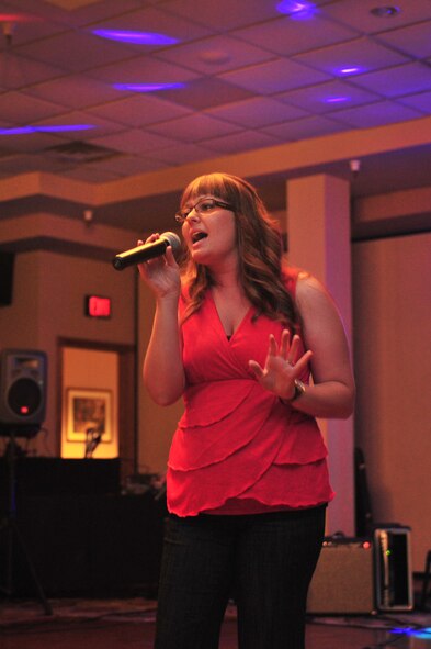 Kaysee Rosario, military spouse, displays vocal ability during the Cannon Idol competition at The Landing Zone at Cannon Air Force Base, N.M., Aug. 4, 2012. Rosario claimed first place and the title of Cannon?s best vocalist. (U.S. Air Force photo/Airman 1st Class Alexxis Pons Abascal) 