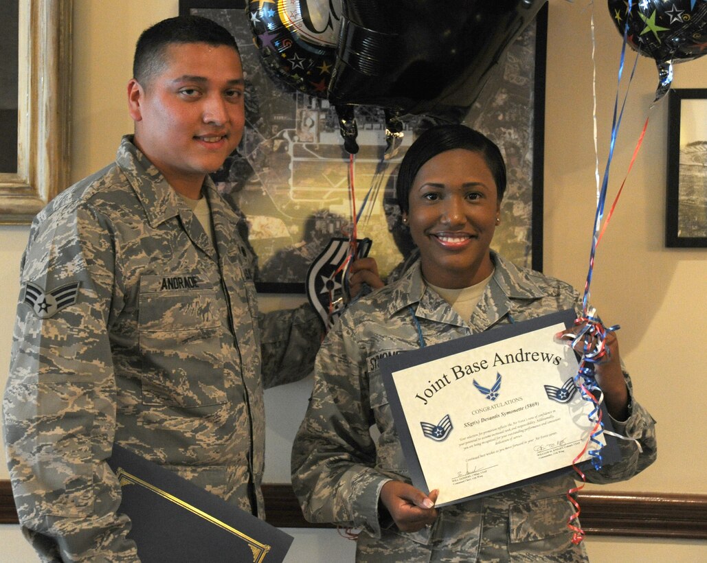 Senior Airmen Daniel Andrade and Deantis Symonette, both 11th Security Forces Squadron Pass and Registration clerks at the visitor control center here, celebrate their selection for promotion at the 2012 Staff Sergeant Release Party at The Club at Andrews on Aug. 3, 2012. This year, the Air Force selected 13,448 of 33,060 eligible senior airmen for promotion to staff sergeant.  (U.S. Air Force photo/Staff Sgt. Torey Griffith)
