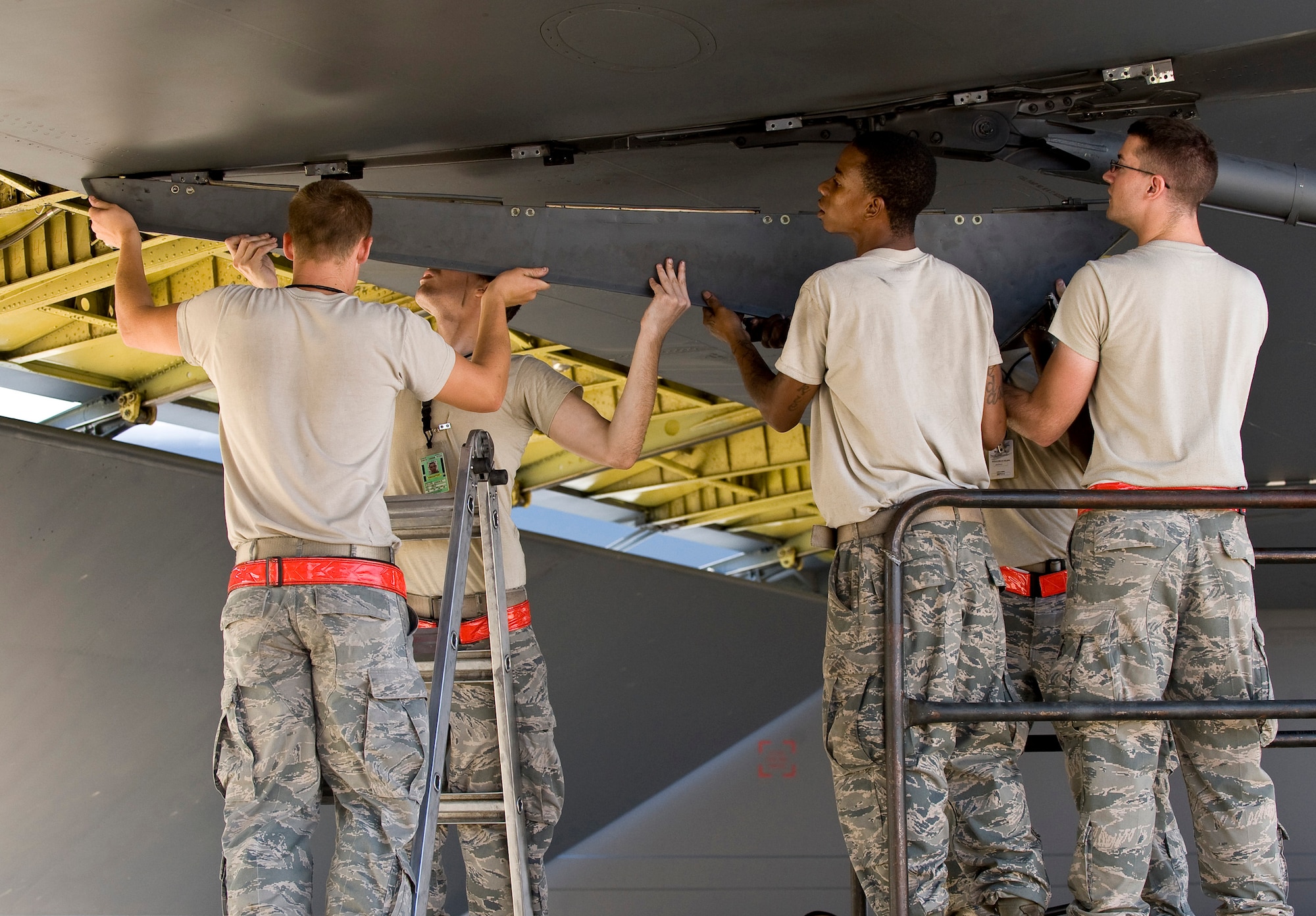 Airmen from the 96th Aircraft Maintenance Unit remove an aft engine nacelle faring from a B-52H Stratofortress on Barksdale Air Force Base, La., Aug. 3. The combined efforts of the 2nd Maintenance Group units resulted in July being the most successful maintenance month here in 16 years. (U.S. Air Force photo/Staff Sgt. Chad Warren)(RELEASED)