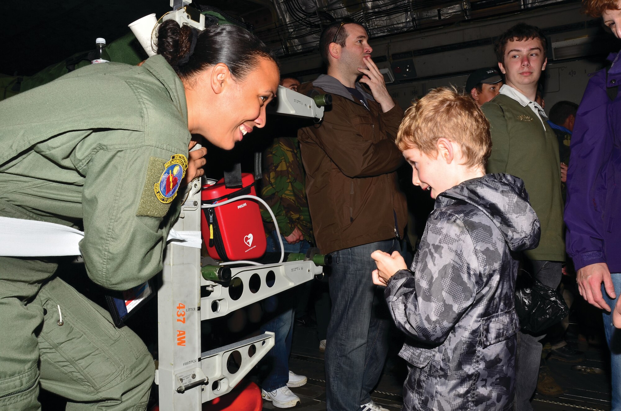 WRIGHT-PATTERSON AIR FORCE BASE, Ohio - Master Sgt. Carie Brown, 445th Aeromedical Evacuation Squadron, explains the medical equipment to a young spectator during the Royal International Air Tattoo July 7 2012. (U.S. Air Force photo/Staff Sgt. Amanda Duncan) 