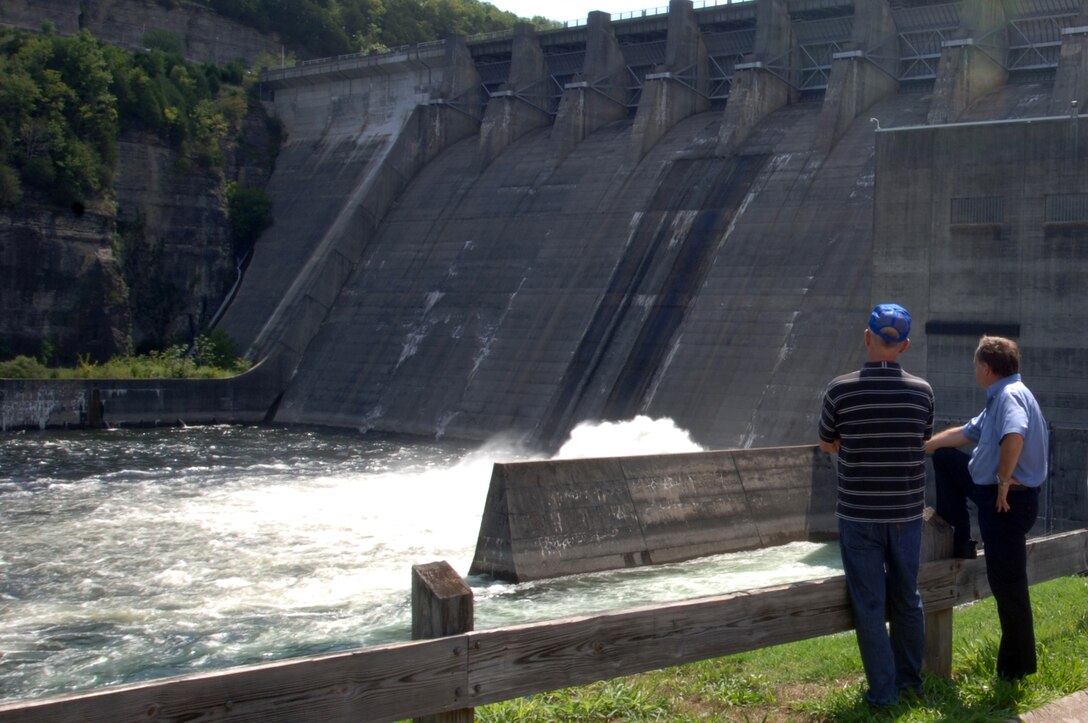 NASHVILLE, Tenn. — Members of the U.S. Army Corps of Engineers 2011 Post-Flood Performance Assessment team watch sluicing operations at Center Hill Dam July 24, 2012. The team visited several Nashville District project sites this week to observe how water management operations within the Cumberland River Basin affected flood operations on the Mississippi River in the spring of 2011. 