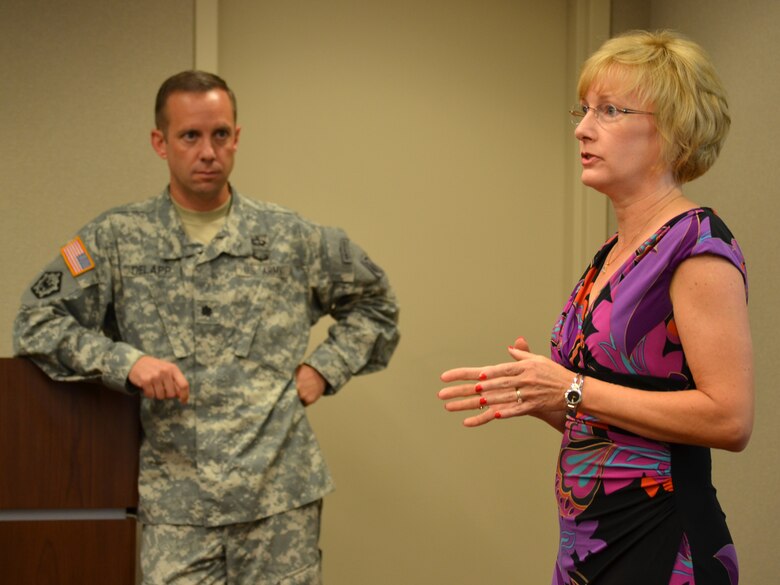 NASHVILLE, Tenn. — Debbie Lee, chief of the Water Management Division at the U.S. Army Corps of Engineers Great Lakes and Ohio River Division in Cincinnati, Ohio, briefs Lt. Col. James A. DeLapp, USACE Nashville District commander, and other district leaders in the room, on the agenda of the 2011 Post-Flood Performance Assessment team from USACE Headquarters during a visit to Nashville July 23, 2012. The team visited Nashville to observe how water management operations within the Cumberland River Basin affected flood operations on the Mississippi River in the spring of 2011. 