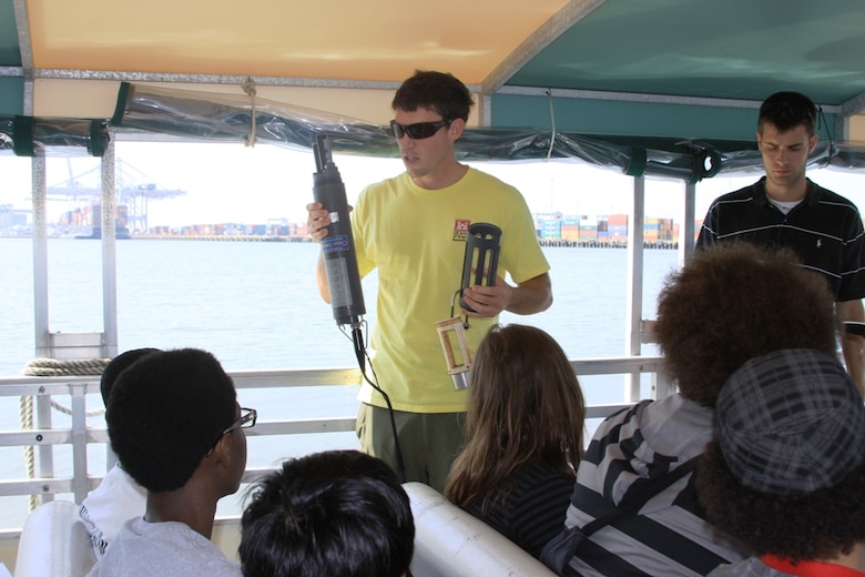 SAVANNAH, Ga. — Jason Lavecchia, a hydraulic engineer with the U.S. Army Corps of Engineers Savannah District, shows a class of Jenkins High School students how to use a water quality probe to measure dissolved oxygen and salinity levels in the Savannah Harbor, July 25, 2012.