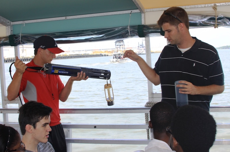 SAVANNAH, Ga. — Bryan Robinson, a hydraulic engineer with the U.S. Army Corps of Engineers Savannah District, shows a class of Jenkins High School students how to use a water quality probe to measure dissolved oxygen and salinity levels in the Savannah Harbor, July 25, 2012.