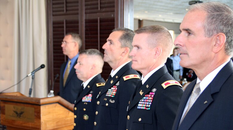 Members of the official party rise for the National Anthem at the an Assumption of Command ceremony for Col. Kent D. Savre July 31 at the Fort Hamilton Community Club in Brooklyn. From right, David J. Leach, U.S. Army Corps of Engineers North Atlantic Division Director of Programs, Col. Kent D. Savre, incoming Division Commander, Col. Christopher J. Larsen, outgoing Division Commander, and Maj. Gen. Todd T. Semonite, U.S. Army Corps of Engineers Deputy Commander and Deputy Chief of Engineers. Robert Bauer, acting chief of regional business at the division, emceed the event.