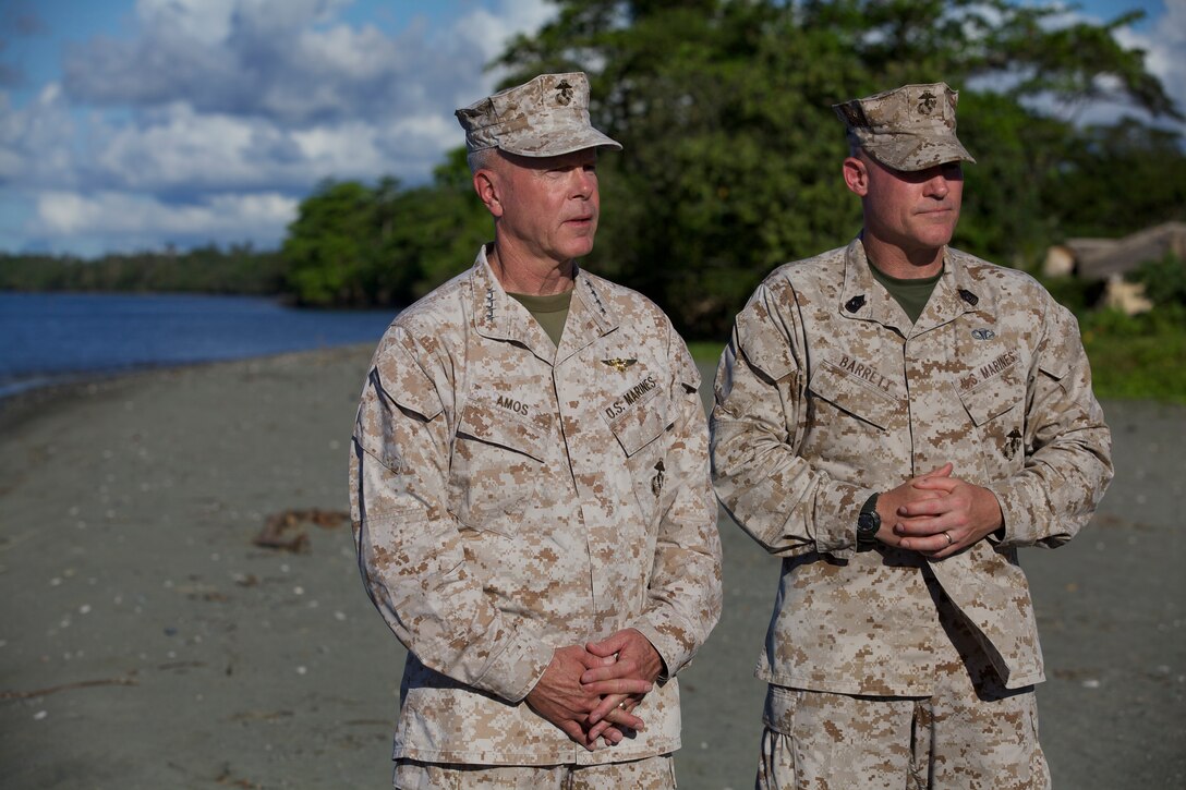 Gen. James F. Amos, the 35th Commandant of the Marine Corps, and Sgt. Maj. Micheal P. Barrett, the 17th Sergeant Major of the Marine Corps, film part of the 2012 Marine Corps Birthday Video during a visit to Guadalcanal, Solomon Islands, Aug. 6, 2012. More images of Sgt. Maj. Barrett are available at http://www.marines.mil/smmc