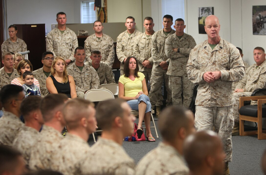 Sgt. Maj. Timothy R. Weber, the director of the Staff Noncommissioned Officer Academy, Camp Johnson, N.C., speaks to Marines and sailors during a Marine Corps Martial Arts Program Instructor course graduation ceremony aboard Camp Geiger, N.C., Aug. 1, 2012.  Petty Officer 3rd Class Michael J. Sency, a religious program specialist with 2nd Marine Logistics Group, along with 35 other students, survived 100 hours of instruction and grueling practical application in a fast paced training environment.  Sency is now part of a very small group of RPs who are qualified to teach Marine Corps Martial arts.