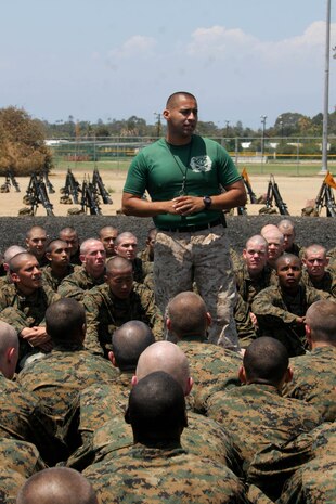 Staff Sgt. Jonh Saracay, martial arts instructor, Instructional Training Company, Support Battalion, explains the fundamentals of different strikes and techniques to Company M, 3rd Recruit Training Battalion Aug. 3 aboard Marine Corps Recruit Depot San Diego. MAI's introduce to recruits the importance of the Marine Corps Martial Arts Program because of the lessons learned through it.  