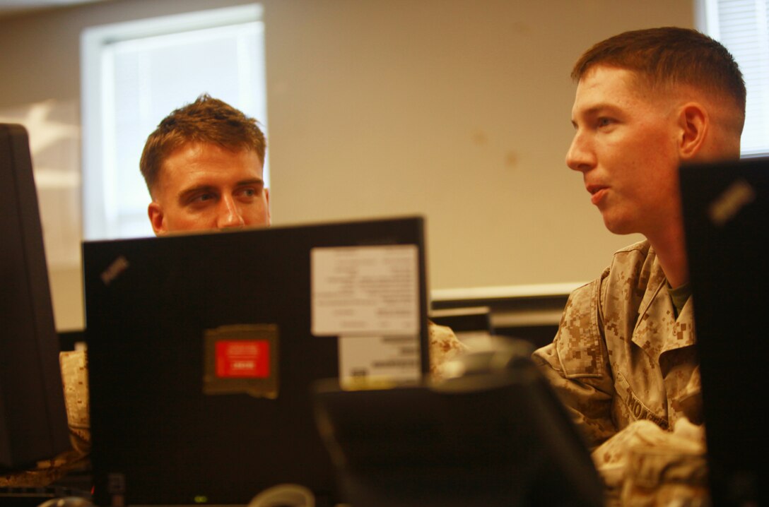 Sgt. Zachary Moats, a Marine with Combat Logistics Battalion 8, 2nd Marine Logistics Group, who will be working in the battalion’s combat operations center during an upcoming deployment, works in the COC aboard Camp Lejeune, N.C., July 24, 2012. Marines and sailors that will be deploying with CLB-8 have been training in the unit’s COC in preparation for the group’s upcoming deployment to Afghanistan.  (U.S. Marine Corps photo by Pfc. Franklin E. Mercado)