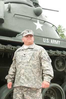 SHAW AIR FORCE BASE, S.C. —Third Army/ARCENT Soldier of the week, Spc. Brian L. Burkette, quarter master, chemical equipment repair stands outside of Patton Hall, Aug. 07, 2012.  Burkette joined Third Army/ARCENT from his previous duty station at Hunter Army Airfield, Savannah, Ga in October 2011. He is originally from New Port, RI dedicating seven-year as a Soldier in the U.S. Army (Photo by Spc. Sharmain Burch Third Army/ARCENT Public Affairs)