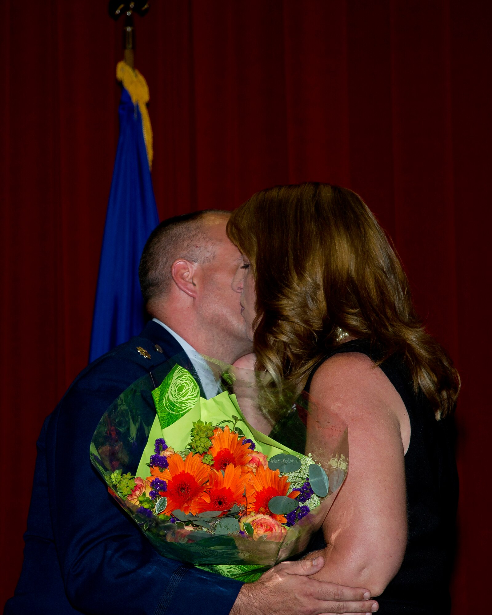 Lt. Col. Scott Minton, 912th Air Refueling Squadron incoming commander, takes command of the 912th ARS from Lt. Col. Brice Middleton, 912th ARS outgoing commander, July 21, during a change of command ceremony in the Cultural Resource Center. Col. Shawn Teagan, 92nd Operations Group commander, Fairchild AFB, Wash., presided over the event. Senior Master Sgt. Eric Butt, 912th ARS first sergeant, holds the guidon which symbolizes the transfer of authority from the old to the new commander. (U.S. Air Force photo by Staff Sgt. Matthew Smith) 