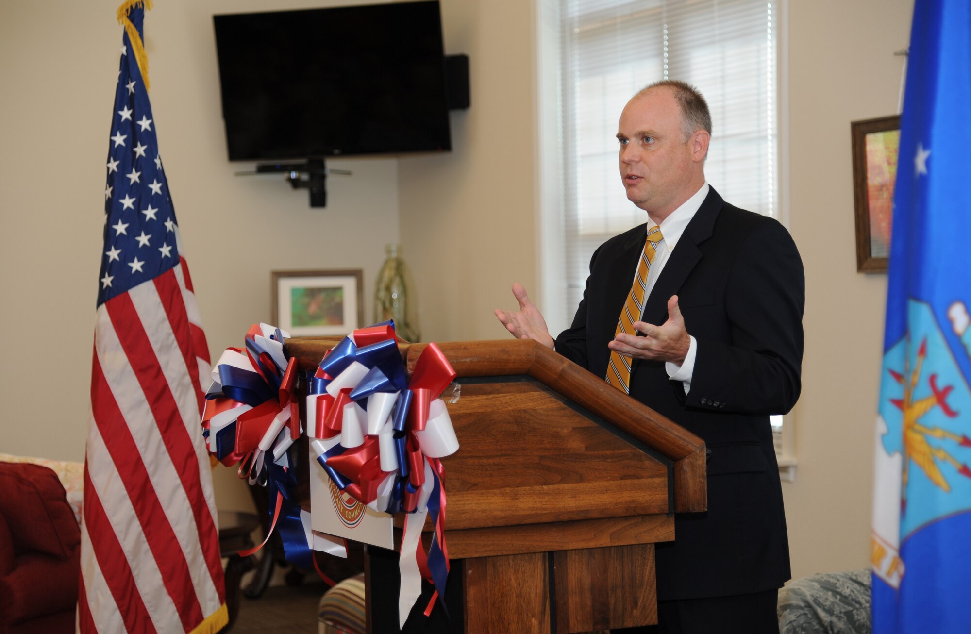 John Hoyt, vice president of Forest City Military Communities and the project executive for the Air Force’s Southern Group privatized housing program, welcomes guests to the Keesler Community Center’s ribbon-cutting ceremony August 7, 2012, in the Bay Ridge housing area at Keesler Air Force Base, Miss.  (U.S. Air Force photo by Kemberly Groue)