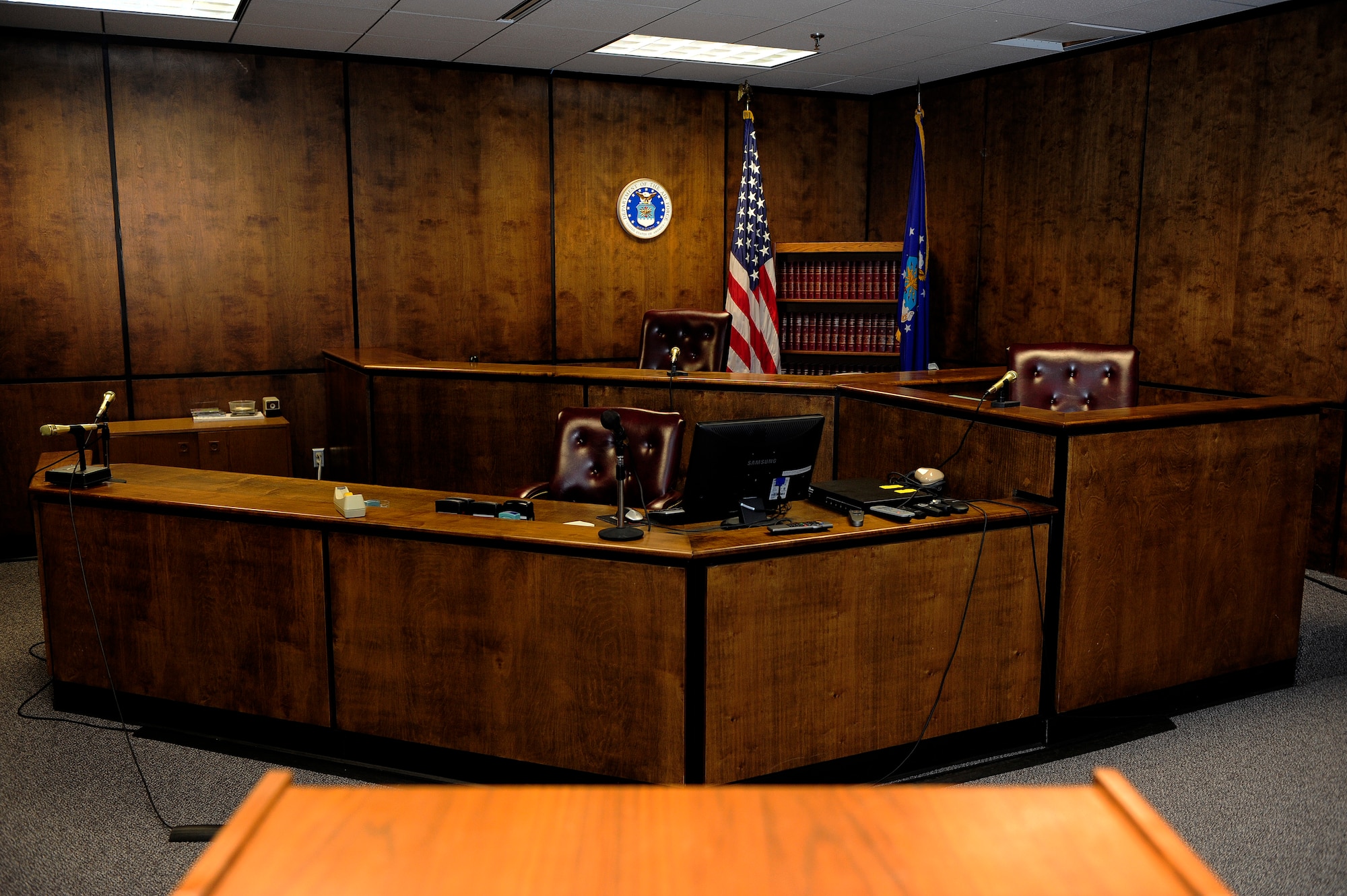 The 20th Fighter Wing courtroom contains all the facilities of a civilian courtroom including a jury box, witness stand, stenographer station and a gallery for those observing the trail. The courtroom has many uses and functions to include court-martials, discharge boards and juvenile-correction boards. (U.S. Air Force photo by Airman 1st Class Daniel Blackwell/Released)