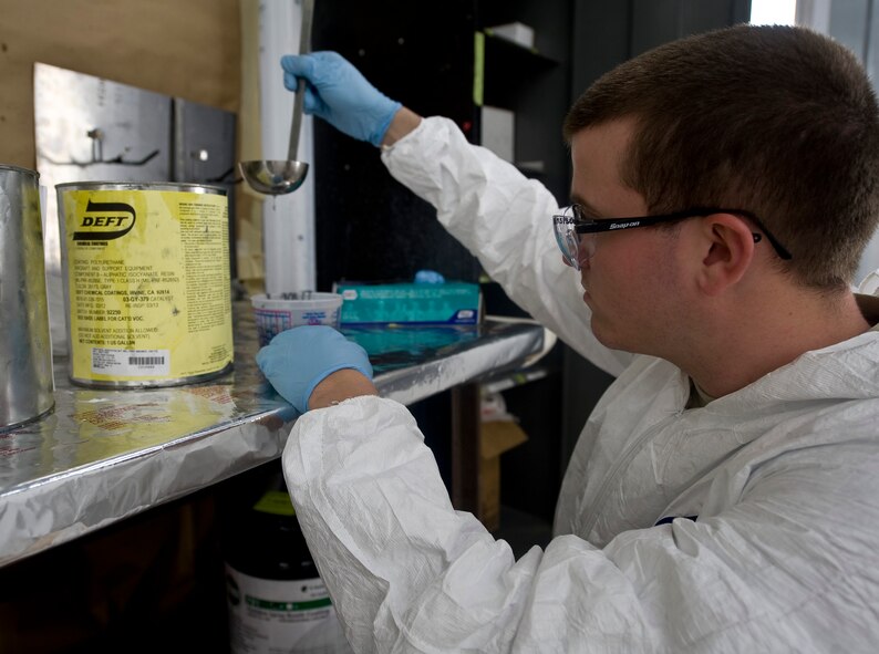 Airman 1st Class Zachary Kelly, 707th Aircraft Maintenance Squadron structural maintenance technician, mixes paint before painting steel panels on Barksdale Air Force Base, La., Aug. 7. Reserve units such as the 707 AMXS, part of the 307th Bomb Wing located here, work in conjunction with active duty Airmen in order to leverage Air Reserve Component experience. (U.S. Air Force photo/Staff Sgt. Chad Warren)(RELEASED)