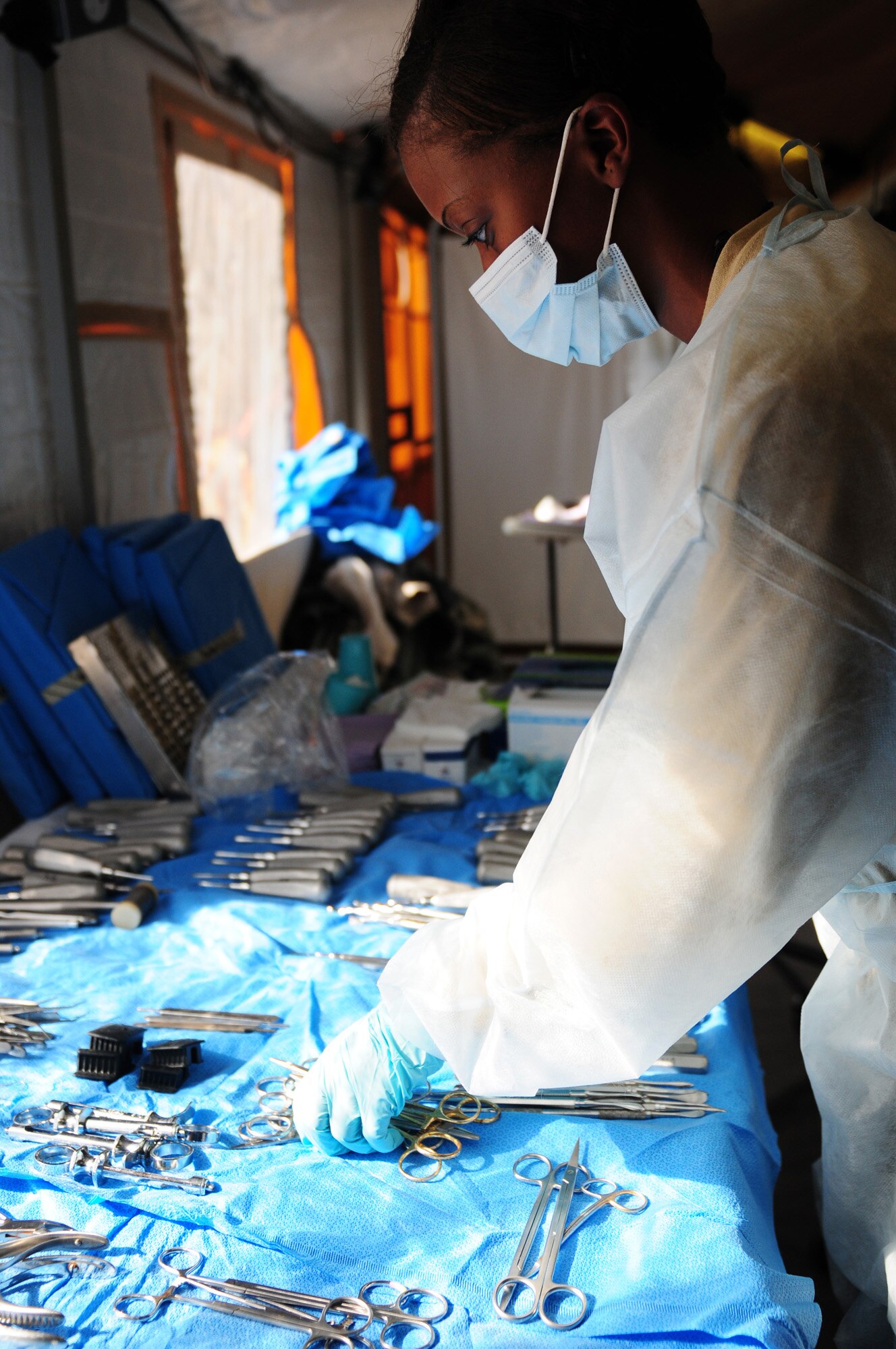 THEBEPHATSWA AIR BASE, Botswana -- U.S. Air National Guard Tech. Sgt. Latoya Turner, dental assistant, organizes dental equipment during a humanitarian civilian assistance at Malwelwe village, Aug. 7, 2012. The HCA was provided by MEDLITE/SOUTHERN ACCORD 12, a key element in a broader series of military-to-military activities that demonstrate the strong partnership between the U.S. and BDF forces. (U.S. Air Force photo/Senior Airman Lausanne Morgan)