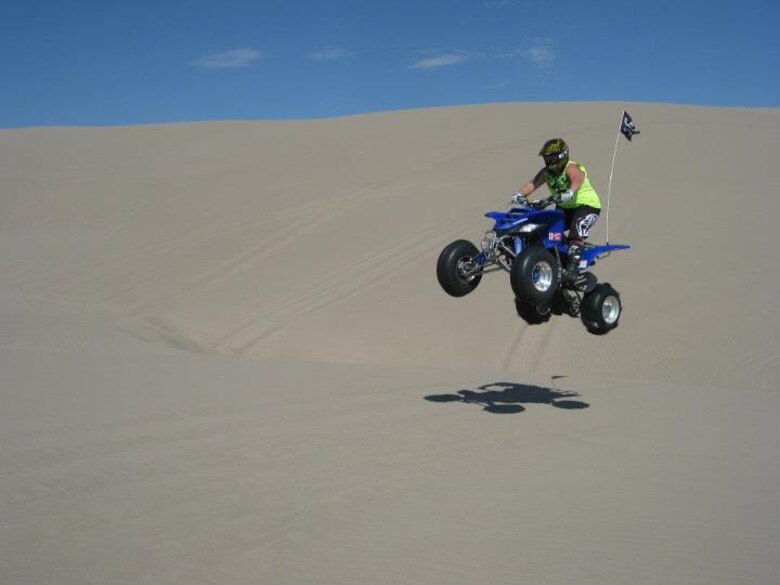 Situational awareness and the right skills enable Brody Rodgers to safely jump a dune and land properly at St. Anthony Sand Dunes, Idaho. (Courtesy photo)