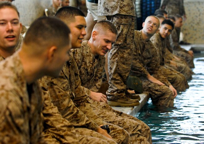 Marines from the 6th Motor Battalion, a Marine Reserve Battalion, converse Aug. 4, 2012 at the Nellis Fitness Center before a portion of their annual aquatic training. Annual training ensures Marines are fit to fight at a moments notice. (U.S. Air Force photo by Senior Airman Jack Sanders) 