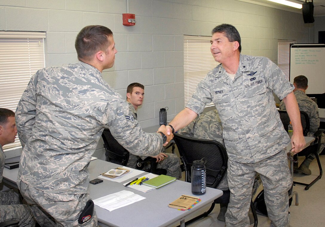 Brigadier General Michael Hepner, 138th Fighter Wing Commander, greets students at the 138th FW Joint Terminal Attack Controller (JTAC) course, located at Camp Gruber, Oklahoma Army National Guard Training Facility.  The school provides Air National Guard tactical air control party (TACP) students with the highest quality career field education and training in order to standardize and expedite the overall JTAC training pipeline. Students who complete the 8 week intensive program are expected to return to their home units ready for a combat mission ready TACP checkout.  Training covers communications, shooting, small unit tactics, off road driving, equipment, navigation, and close air support basics.  The training program was recently relocated from Ft. Sill Army post to the Army National Guard Training Facility located in Braggs, Oklahoma.  (National Guard photo by Master Sergeant Preston Chasteen/Released)